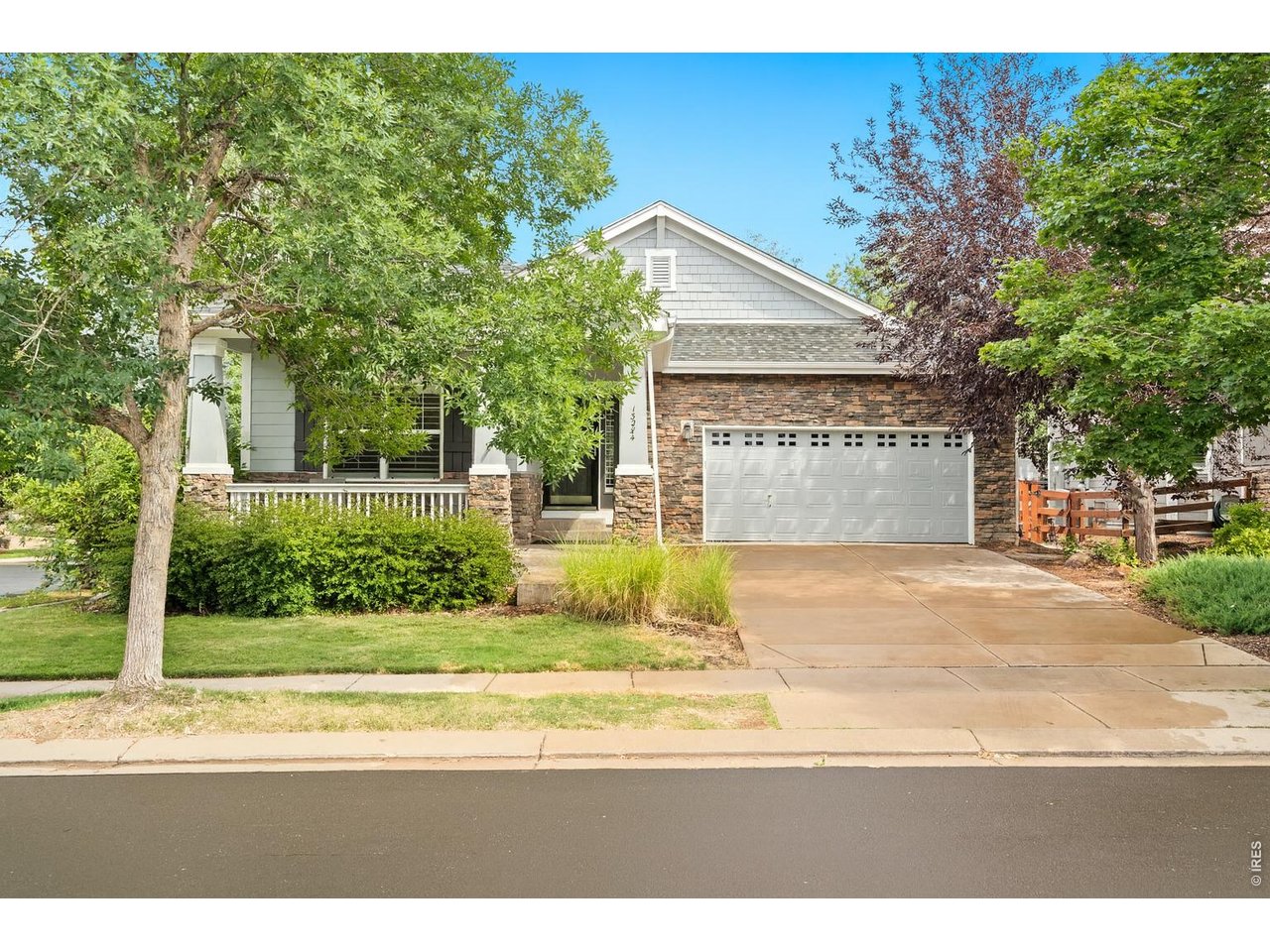 Welcome to 13284 Elk Mountain Way in Broomfield's Redleaf neighborhood. This beautifully updated ranch offers a functional floor plan, generous living space, and a private backyard in a location that is hard to beat.The main level features vaulted ceilings, hickory engineered hardwood floors, plantation shutters, and a spacious great room with a gas fireplace. The kitchen includes a gas range, center island, pantry, and plenty of workspace, opening naturally to the dining and living areas. A dedicated main floor office gives you additional flexibility.The primary suite is nicely separated from the other bedrooms and includes a 5 piece bath and large walk in closet. The finished basement adds even more living space with a large family room, additional bedroom and bathroom, plus an oversized storage room with egress windows and potential for additional finished space.Outside, the covered patio overlooks a professionally landscaped yard with a peaceful water feature, creating a private space to relax or entertain. The corner lot adds even more privacy.Recent improvements include fresh interior and exterior paint, hickory engineered hardwood flooring, plantation shutters, and epoxy flooring in the 2 car garage. A mudroom adds everyday convenience and extra functionality.Located near parks, trails, recreation, shopping, restaurants, and major roadways, with Legacy High School nearby, this Redleaf ranch offers the space, updates, and location that make it easy to feel at home.