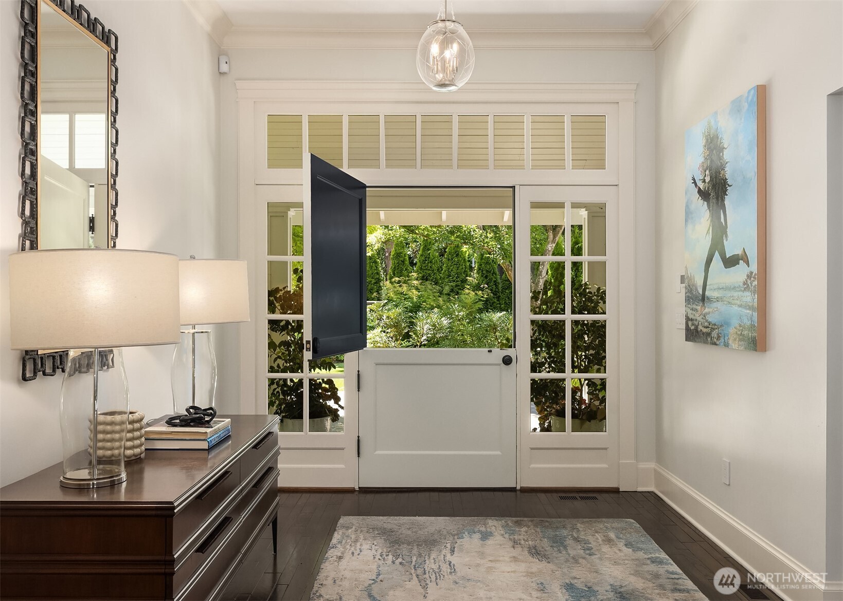 Charming front entry framed by a Dutch door