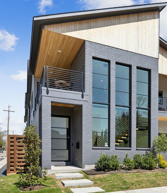 Gorgeous modern architecture from Savannah Custom Homes. The heart of Urban Dallas - walkable to lower Greenville, Knox Henderson, Trader Joe's. Stroller and dog friendly with many nearby parks and quick access to Katy Trail, White Rock Lake and downtown. Dallas Love Field or DFW 15 miles or less. 75 Walk Score and 68 Bike Score!!
Step inside to soaring ceilings, loads of windows and natural light in an oasis of luxury and warmth. No detail has been overlooked in this modern masterpiece with clean simple lines, warm wood tones, abundant sunlight and a floorplan that lives large and open. Downstairs features a bright foyer, kitchen with architectural features open to living, huge walk in pantry, a large downstairs bedroom that could serve as an office and a full bathroom for guests or downstairs living. Upstairs a large open living room with a built in coffee or beverage area, covered balcony with amazing views, huge primary suite and two additional bedrooms both with en-suite baths. The spa like primary bath features a freestanding feature tub, a walk-in frameless glass shower, separate vanities and a large closet that walks thru to the utility room for easy access. Outdoors a large covered living room with fireplace access through stacking sliding window doors allow an extension of the living room for entertaining and relaxing in the fresh air. An attached two car garage with EV charging station. This magnificent home is an easy lock and leave or investment property with 4 full bed bath suites, additional street parking and only minutes to SMU.
