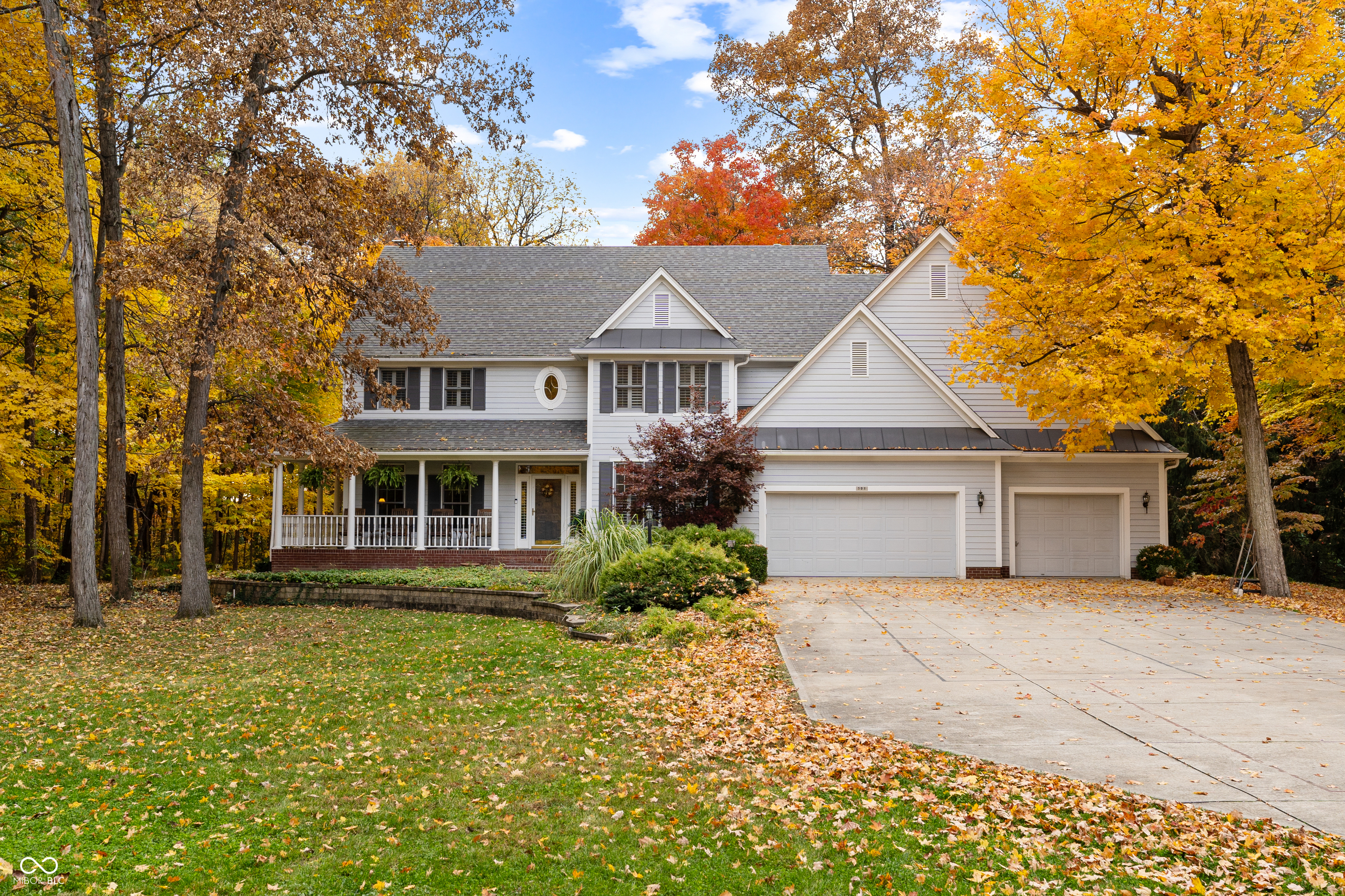 Experience peace & tranquility just 15 min from downtown Indy in this stunning 4 bed 4 bath 5,000+ sq ft retreat estate on 3.68 natural, wooded acres surrounded by 20+ forested acres. This fully-custom, masterfully-built architecture's dream is enveloped by the sights/sounds of nature; home to songbirds, hawks, owls, deer & the occasional fox. Step inside to find natural light pouring through plantation-shuttered windows as you relax in thoughtful, spacious, & hand-crafted spaces. The kitchen is a chef's dream w granite c'tops, solid walnut-covered island, 2 sinks/ovens, & a beautiful pantry. Laundry/project room w heated floors & many cupboards to accommodate many interests/needs. The stately old-fashioned library w 10ft+ tall bookshelves serviced by a library ladder is straight out of a movie. Primary en suite offers a fireplace, garden tub & a tiled two-person shower w dual heads. Unwind in the private Rathskeller w coppertop wet bar, pool table & cleverly-hidden retractable-in-the-wall dart board. Enjoy a cocktail or a vintage from the enclosed, naturally-chilled wine room. Tinker away in the expansive 3-car, racing-floored garage w 8x10 side room. Need more space for storage/fun? Try the 1200 sq ft high-ceiling attic perfect for any hobby & large enough for a full-size golf simulator! The estate sits 20 min from the Indy airport & a short walk to downtown Beech Grove w local cafes, year-round events, thriving restaurants, & public library. The nearby Franciscan Trail offers miles of scenic paths for biking-walking-exploring while the Bolton Park offers playgrounds/pickleball. Meticulously-maintained & improved by the same conscientious owners for 20+ years. Please see the attached list of improvements as the list is too long to include in this description. The next owner of this estate will be inheriting a passion project they will surely love & enjoy for years to come! Priced to sell as it would cost well-over $1m to recreate/build in today's market.