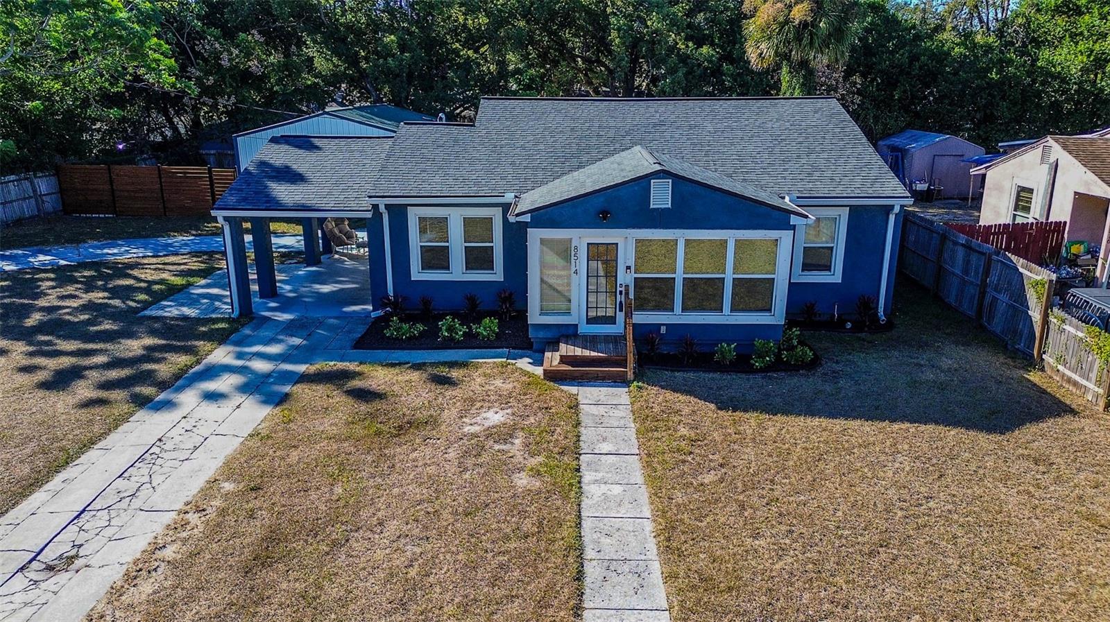 Welcome to 8514 N Lynn Ave — a charming, remodeled 3-bedroom, 2-bathroom POOL HOME on an OVERSIZED 11,500 sq. ft. lot with DETACHED WORKSHOP, offering the perfect blend of comfort, functionality, and Florida living.From the moment you arrive, the home greets you with wide frontage and plenty of space extra vehicles, a boat or RV, or even space to build an ADU! Classic bungalow architecture wrapped in clean stucco and warm wood accents gives the exterior a timeless, inviting look.Inside, the layout opens immediately into a bright sunroom - a versatile space perfect for morning coffee, hobbies, or indoor-outdoor living. The spacious living room flows effortlessly into the dining area—ideal for hosting gatherings, game nights, or quiet evenings in. Durable ceramic and porcelain tile flooring runs throughout, setting a modern, low-maintenance tone.At the center of the home is the updated kitchen, complete with stone countertops, oversized island, convection oven and range hood. Perfect for cooking, entertaining, or prepping for the week.The primary suite sits privately on its own side of the home, featuring a built-in closet and a stylish en-suite bath.And then there’s the shop.A dedicated double-bay workshop with its own 100-amp circuit sits just steps from the home—an incredible opportunity for craftsmen, mechanics, hobbyists, or anyone running a home-based business. With a 200-amp service to the main house, you have all the power and flexibility you could ask for.Out back, the fun continues. A private fiberglass pool sits just off the newly built deck, creating the perfect spot for weekend swims, BBQs, or lounging the day away. The yard is fully fenced with an additional shed for all your pool, lawn maintenance tools or outdoor equipment.The area is another major win. You’re centrally positioned to enjoy some of Tampa’s best attractions:    •    6.5 miles to Downtown Tampa / Benchmark Arena    •    6.1 miles to Raymond James Stadium    •    4.6 miles to Busch Gardens Tampa Bay    •    13 miles to MacDill AFB    •    12 miles to TPA.With public utilities, central AC and heat, tankless water heater, smart-home touches like a programmable thermostat, and no HOA or leasing restrictions, this property offers freedom and flexibility that’s hard to find.