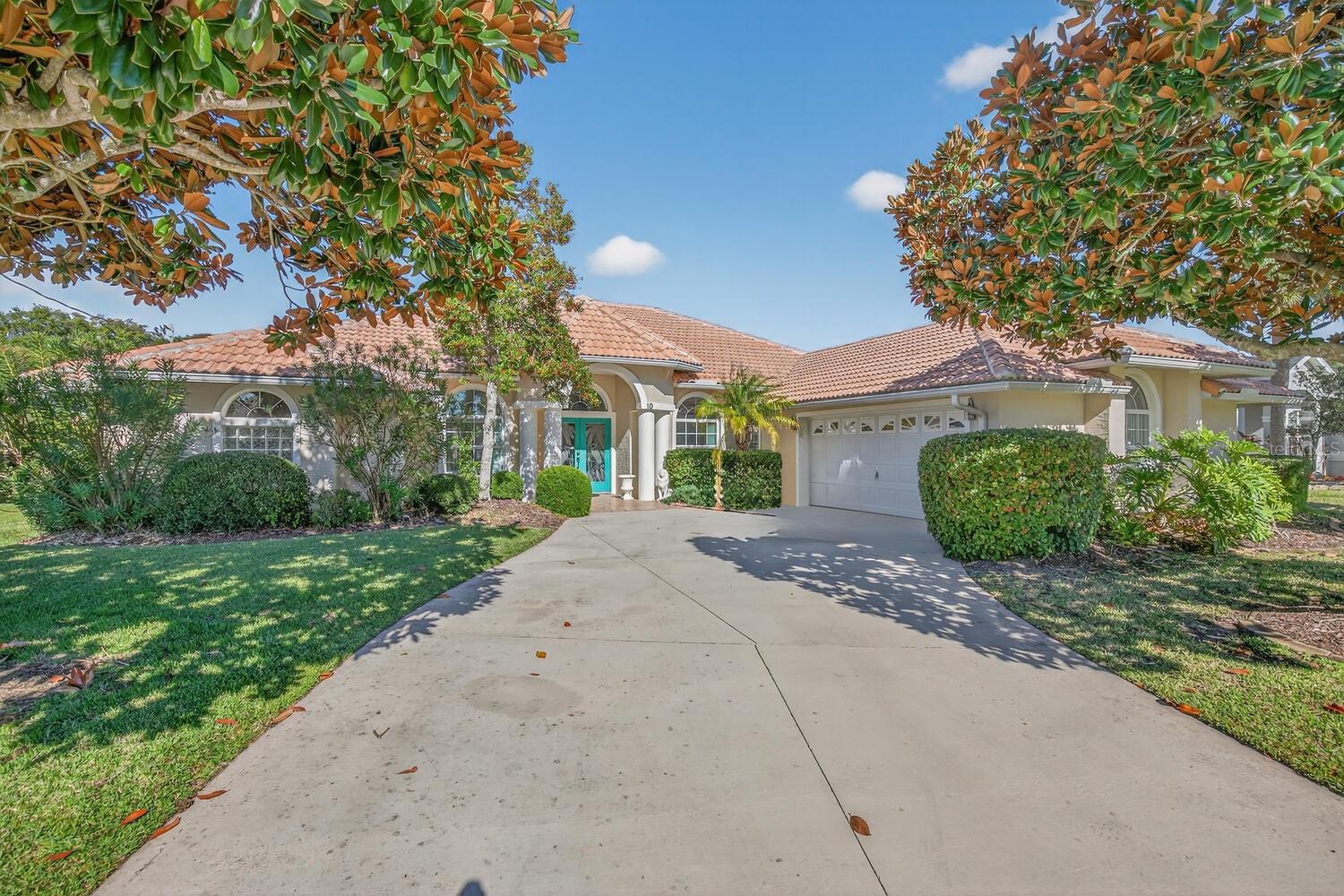 Welcome to Your Waterfront Retreat at 10 Collinson Ct, Palm Coast, FLNestled in the desirable Palm Harbor neighborhood, this stunning tile-roofed Mediterranean-style home offers 4 bedrooms, 2.5 bathrooms, and the perfect blend of comfort, style, and coastal living. Built on a prime saltwater canal lot with 80' of frontage, you'll enjoy serene water views from most rooms—including the living room, primary bedroom, remodeled kitchen, family room, and breakfast nook.Chef's Dream Kitchen Remodeled in 2023 with new cabinets, granite countertops, backsplash, and stainless steel appliances. Ample cabinetry and beautiful finishes make this space ideal for entertaining while overlooking the canal. Primary Suite features large walk-in closets, stunning views of the pool and water, and an ensuite bath with double vanity, soaker tub, and tiled shower. Three guest bedrooms provide plenty of room for family or visitors. Unmatched Outdoor Oasis - Embrace Florida living at its finest with a sparkling pool and spa (resurfaced in 2025)—perfect for escaping the summer heat. The oversized 47' wide screened/vinyl-enclosed rear porch allows year-round enjoyment: keep the vinyl panels for cozy winter months or remove them in summer for open-air breezes. Boating enthusiasts will love the private boathouse with a new 8,000 lb lift motor, water, and electric at the dock. The composite dock was fully rebuilt in 2024 with AZEK decking and new beams. With a covered dock and quick access you're ready for fishing, sunset cruises, or effortless boating adventures. Beautiful landscaping, including mature magnolia and fig trees, enhances the property's curb appeal and privacy. Recent Updates for Peace of Mind -Tankless water heater (2024) -HVAC system (2020).  Palm Coast offers an exceptional lifestyle with over 140 miles of biking and walking trails, beautiful beaches, parks, sports fields, dining, and more!  Just a short drive to historic St. Augustine or vibrant Daytona Beach.  Schedule your showing today!