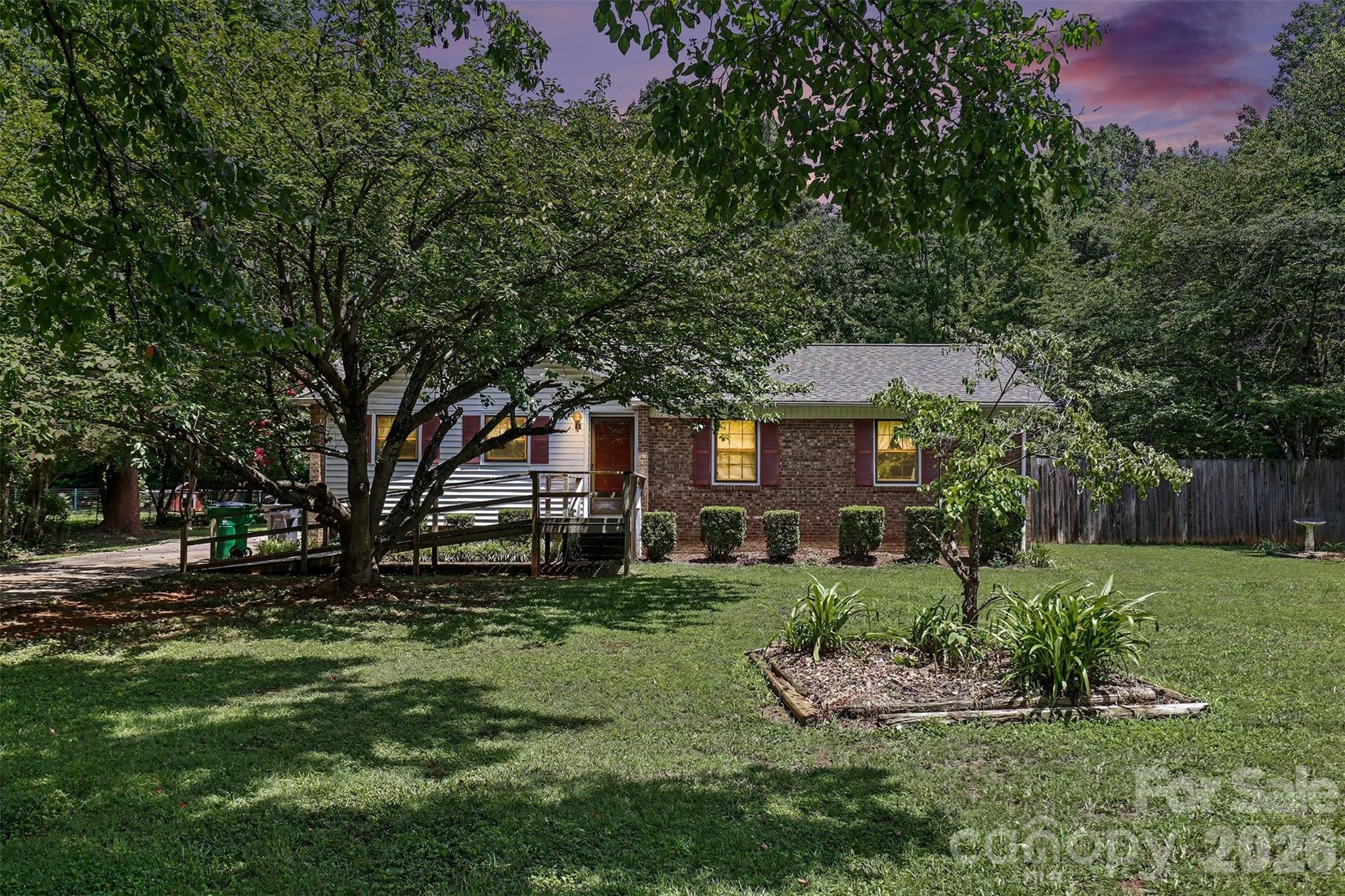 Opportunity awaits with this single-family home situated just minutes from Uptown! Nestled on a beautiful half-acre lot with a park-like setting, this property offers endless potential for buyers looking to make it their own.Inside, the open floor plan features 3 bedrooms and 2 full bathrooms, creating a spacious layout ideal for everyday living and entertaining. Step outside to enjoy the in-ground pool surrounded by mature landscaping, offering a private backyard retreat.While the home could benefit from updating, its desirable location, generous lot size, and functional layout provide an excellent opportunity to renovate and build equity. Whether you're searching for a primary residence, investment property, or your next renovation project, this home is ready for your vision.