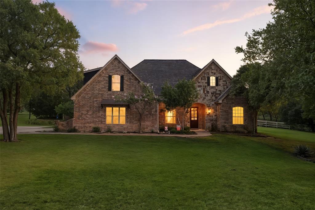 Luxury Living in Aledo’s Stone Creek Farms – Private Pool, Media Room & Gourmet Kitchen! Tucked away at the end of a peaceful cul-de-sac and surrounded by mature trees, this stunning home in the prestigious Stone Creek Farms neighborhood offers both privacy and elegance. Step inside to discover rich hardwood floors and an open-concept layout that seamlessly blends comfort with style. The gourmet kitchen is a chef’s dream, featuring a built-in GE Monogram refrigerator, gas cooktop, double ovens, and a sleek, functional design perfect for entertaining. Upstairs, enjoy a spacious game room and a cozy media room—ideal for movie nights and game days. Step out back to your private oasis: a sparkling pool and a built-in Jenn-Air grill, perfect for summer fun or relaxing evenings. Located within the highly acclaimed Aledo ISD and just minutes from I-20, shopping, dining, and entertainment, this home truly has it all. Don’t miss your chance to own a slice of luxury in one of Aledo’s most sought-after communities!