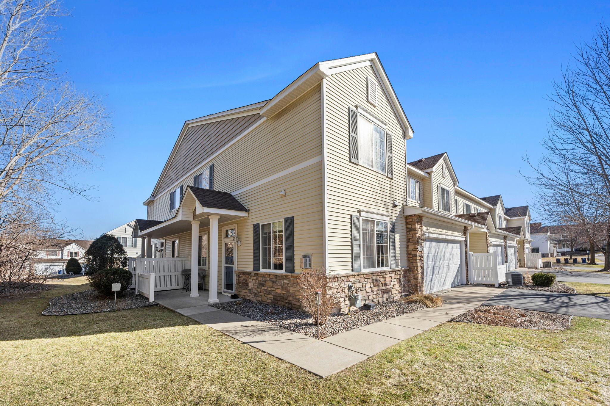 Beautifully maintained 2-bedroom, 2-bathroom end-unit townhome in a peaceful Inver Grove Heights neighborhood, just steps from scenic ponds, parks, and Southview Country Club, with easy access to major roadways for a seamless commute.The inviting main level features 9-foot ceilings and abundant natural light, creating a bright, welcoming atmosphere. The cozy living room offers plush carpeting and a Heat-N-Glo fireplace, perfect for relaxing or entertaining. The open-concept layout flows into the dining area with statement lighting and a stylish kitchen complete with stainless steel appliances, under-cabinet lighting, a two-tier peninsula with breakfast bar seating, and a walk-in pantry. A powder room, spacious closet, and attached 2-car garage add everyday convenience.Upstairs, a versatile loft provides ideal space for a home office, media room, or additional living area. Two generously sized bedrooms include ceiling fans, with the primary offering a large walk-in closet. The oversized full bath features both a walk-in shower and tub/shower combination. Upper-level laundry adds ease to everyday routines. Enjoy a private front patio and serene surroundings!