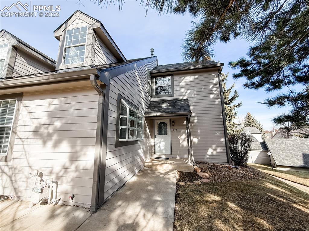 Welcome to 274 Cobblestone Drive, proudly offered by its original owner, where comfort, views, and thoughtful updates come together.  Perfectly positioned with golf course views of the Country Club of Colorado off the back deck and sweeping views of Cheyenne Mountain, this home offers an exceptional setting.The newly updated kitchen, completed in 2024, features stainless steel appliances, modern finishes, and a fresh, inviting design that makes everyday living and entertaining a joy. Luxury vinyl plank flooring enhances the entry and kitchen. The LVP flooring continues into the upstairs bathroom, adding durability and a cohesive, modern touch.The main level includes a bedroom and full bathroom, ideal for guests or convenient single level living. Upstairs, the private primary suite offers its own full bath and a versatile loft space that works beautifully as a home office, reading nook, or flex area.The finished basement expands the home’s functionality with an additional living room, laundry area, and generous storage and workshop space.Step outside to the lovely deck, the perfect place to enjoy your morning coffee or unwind in the evening while taking in the golf course and mountain views.With its updated kitchen, flexible floor plan, and breathtaking views, 274 Cobblestone Drive offers a rare opportunity to experience Colorado living at its finest.