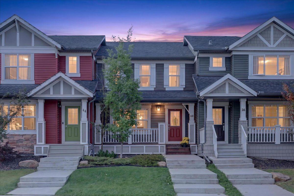 Welcome to Sunset Ridge, one of Cochrane’s most sought after communities, where mountain views, scenic pathways, parks, playgrounds, schools, and everyday amenities come together to create an exceptional lifestyle. With its pleasant, welcoming curb appeal and inviting front porch, this beautifully maintained 3-bedroom, 2.5 bathroom townhome with BRAND NEW CARPET offers the rare advantage of NO CONDO FEES, giving you the benefits of townhome living without the monthly fees. Step inside from the welcoming front porch to a bright, open concept main floor designed for both everyday living and easy entertaining. The spacious kitchen offers a ton of counter space, granite countertops, mocha stained cabinetry, a central island, and stainless steel appliances, with plenty of room to prepare meals while staying connected to the dining and living areas. Large windows fill the main floor with natural light and overlook the fully fenced, low maintenance backyard. Step outside to the extended deck, the perfect spot for summer BBQs, entertaining friends, or enjoying a quiet evening outdoors. The low maintenance yard means more time enjoying your home and less time maintaining it.Upstairs, you’ll find three spacious bedrooms and two bathrooms, including a generous primary bedroom complete with a walk-in closet and private ensuite. The additional bedrooms offer excellent flexibility for children, guests, or a home office. The unfinished basement provides plenty of potential for future living space, a recreation room, gym, media area, or additional storage. A dedicated laundry room is conveniently located in the basement. Additional features include central air conditioning, laminate and tile flooring, and a double detached garage providing secure parking and excellent storage. Whether you’re a young family looking for room to grow, a single or professional couple wanting a low maintenance home, or someone looking to downsize without giving up space and convenience, this home offers an excellent combination of comfort, functionality, and lifestyle. Located in one of Cochrane’s best communities, you’ll enjoy easy access to schools, parks, playgrounds, extensive walking and biking paths, shopping, restaurants, and major routes to Calgary and the mountains.