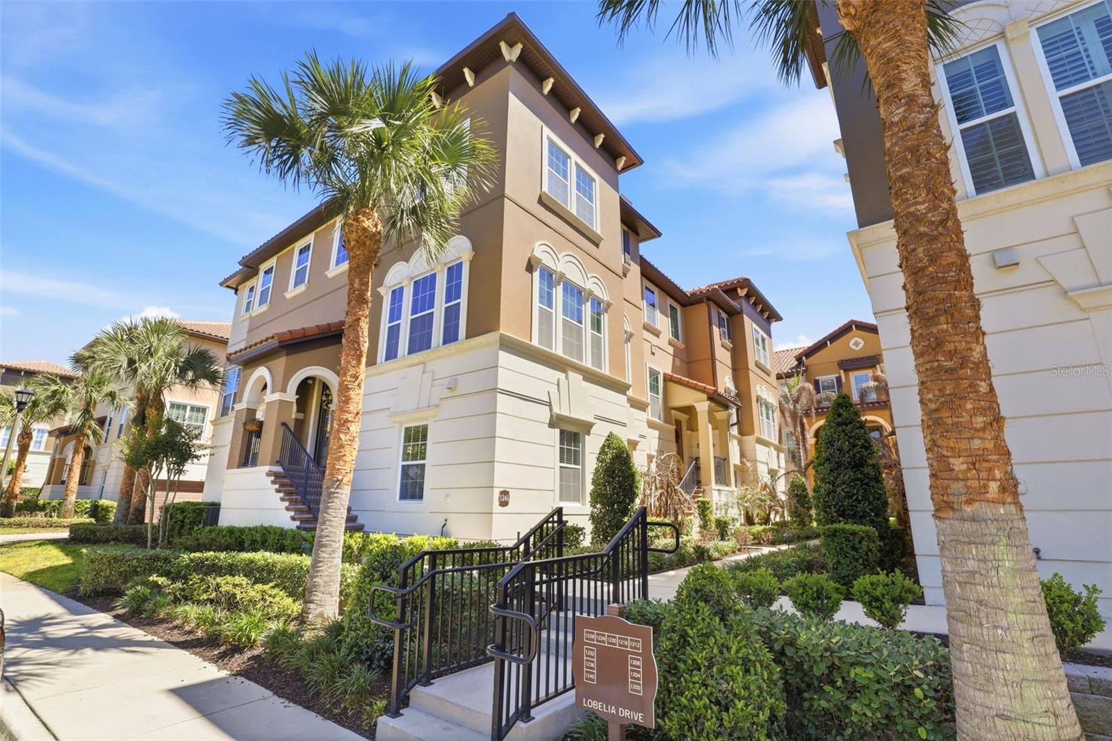 Welcome to this meticulously cared for and beautifully upgraded end unit townhome in Fountain Parke, one of Lake Mary’s most recognized and sought after communities. This never before listed property boats of upgrades throughout and is the perfect example of what “move-in ready” looks like. The incredibly popular Torino model is extremely versatile, and this is no exception. The first floor has been crafted into a stunning Living and entertaining space featuring a built-in and custom designed, hand crafted shelving and entertainment unit with accent lighting and perfectly complimented by an electric fireplace. The walk-in closet has been reimagined into a wine room, and can easily be morphed back into its’ original intended use if so desired. The main level is home to a Kitchen that will take your breath away with gorgeous cabinetry, including custom crafted and installed upper cabinets with glass display doors and accent lighting. Stainless appliances, Granite counters, tasteful tile backsplash, and pendant lighting to compliment the island that also serves as a breakfast bar as well! custom installed. The Dining area and Sun room are adjacent to the kitchen to create a beautiful environment for entertaining with peaceful relaxation only steps away. French door access to the screen enclosed patio from this area provides a wonderful setting to enjoy morning coffee and restful evenings after a busy day. The main Living area, like the rest of this end unit model, is swimming in natural light and also offers yet another example of craftsmanship with yet another custom designed and hand crafted wall unit, complete not only with another electric fireplace but ALSO a built-in wine refrigerator. Custom lighting featured in all the stairwells and updated fans and fixtures throughout this home must be seen to be appreciated. This is your chance to call Fountain Parke home, complete with 24 hour security, resort style pool, fitness center and Clubhouse, tennis courts, dog parks, and the ideal location in the heart of Lake Mary. Call today for your private showing.