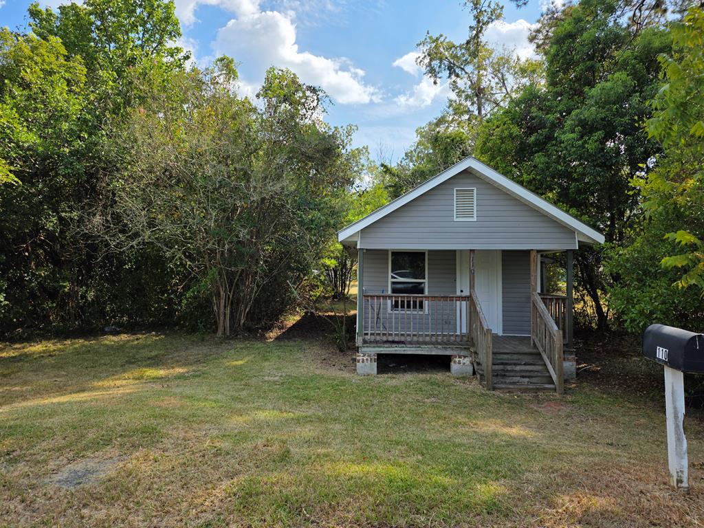 Nestled in the charming town of Thomasville, GA, this cozy studio cottage offers a unique opportunity for those looking to downsize or invest. Perfectly suited for a college student or anyone seeking low-maintenance living, this home features a sturdy metal roof that promises durability and style. Step inside to discover an inviting open layout that maximizes space and versatility.  Located just moments away from Thomasville's delightful shops and eateries, you'll appreciate the perfect blend of small-town charm and modern convenience. This studio cottage represents an excellent investment opportunity—embrace the potential to create something special or enjoy it as-is. Don't miss out on making this hidden gem your own!
