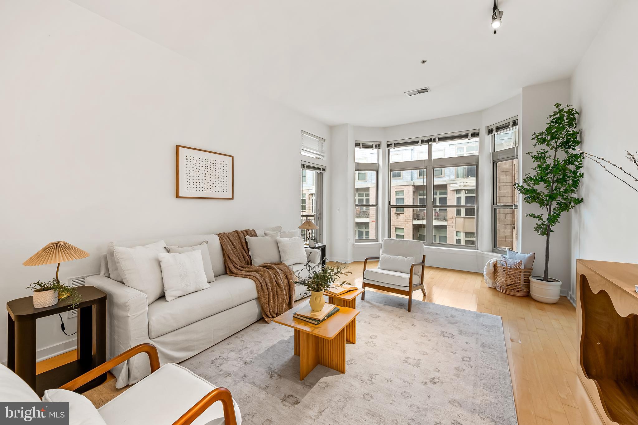 A rare opportunity to own the only two-bedroom plus den residence with a quiet interior courtyard view at 1209 N Charles Street—truly the best unit currently for sale in the building. Located in the heart of historic Mount Vernon, this spacious, light-filled condo offers two true bedrooms, a separate den or home office, and large windows overlooking the tranquil interior courtyard. Enjoy peaceful living with no street noise, plus the convenience of a deeded parking space and private storage unit—rare finds in the city. Extensive updates include a new HVAC system and water heater (2019), full interior repaint and new appliances (2020–2023), and refreshed bathrooms. Ideally located just blocks from Baltimore Penn Station with MARC and Amtrak service to D.C., Philadelphia, and New York, as well as the Hopkins Shuttle, this home offers unmatched connectivity and long-term value. Set in one of Baltimore’s most walkable and vibrant neighborhoods, you’ll love being steps from The Lyric, The Walters Art Museum, The Meyerhoff Symphony Hall, The Charles Theatre, and countless restaurants, cafés, shops, yoga studios, and parks. Sophisticated city living at its best.