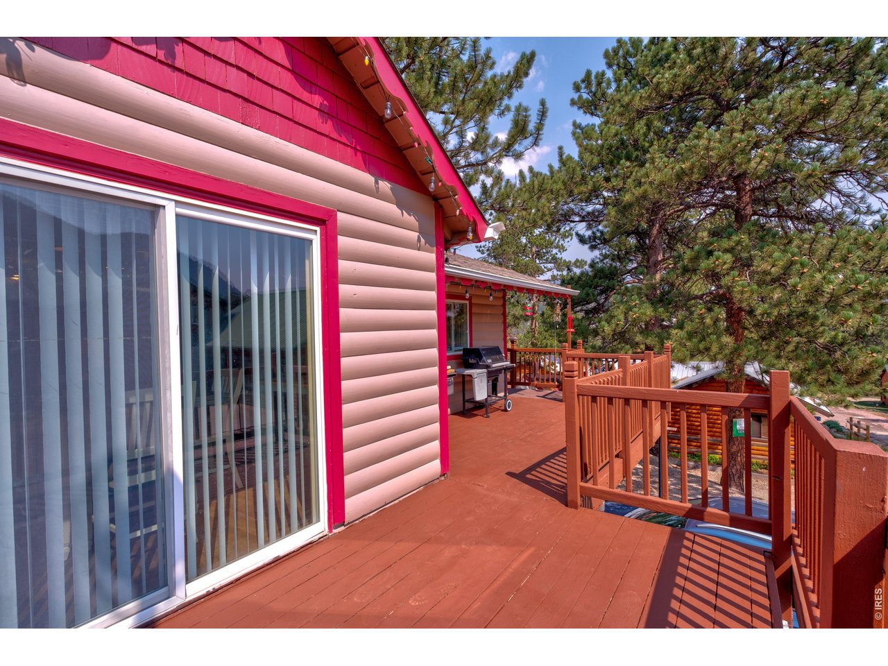 Nestled in the heart of the Estes Valley, this inviting ranch-style home with a finished basement offers the perfect blend of comfort, convenience, and adventure. Whether you're searching for a full-time residence, a vacation getaway, or an investment opportunity, this property, sitting on popular Riverside Dr offers mountain lifestyle buyers dream about. Located only 0.7 miles from Rocky Mountain National Park you'll have world-class hiking, wildlife viewing, and endless outdoor recreation at your fingertips. Conveniently located approximately 90 minutes from DIA, 45 minutes to Loveland or Boulder. You'll appreciate the home's warm and welcoming character. Step inside, through the spacious sunroom, where abundant windows fill the space with natural light and provide beautiful views of the surrounding landscape. This versatile area also features a cozy study nook with a built in desk, making it and our super fast Trailblazer internet the perfect spot to work remotely. The living area is highlighted by a stunning moss rock fireplace that serves as the centerpiece of the home, creating a cozy atmosphere for cool mountain evenings. The thoughtfully designed floor plan includes a desirable main-level primary suite with a en-suite bathroom and private access to the wraparound decks. Imagine stepping outside each morning to breathe in the crisp mountain air or ending your day beneath a canopy of stars. The finished basement offers additional living space, ideal for guests or boasts the potential for a separate rental opportunity. This home's layout provides flexibility to fit a variety of lifestyles. Outside, the property continues to impress with a fully fenced yard and a wrap around deck. This home combines the charm of mountain living with the conveniences of being in town. Don't miss this opportunity to own a slice of Colorado paradise in one of the state's most sought-after destinations. Schedule your private showing with me today!