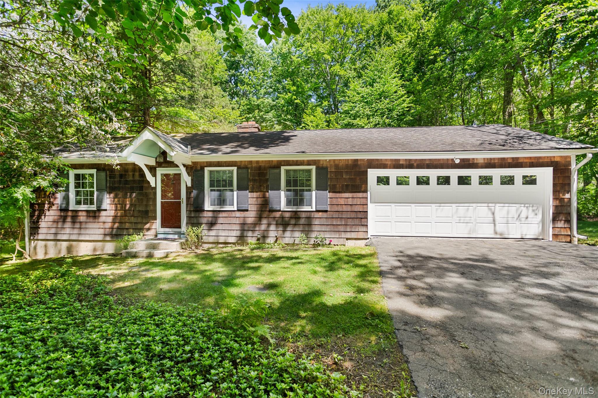 A LITTLE JEWEL. First time offered in years! Off a quiet cul-de-sac in the heart of Eastwoods. Over two peaceful acres with level lawns, natural woodlands and flowering Mountain Laurel, Hosta and Peonies. Charming Shingle Ranch offering an easy, one-level lifestyle. Sun-filled Living Room with fireplace and open Dining Area. Kitchen with door to awning-covered deck for outdoor entertaining. Two Bedrooms. A great little house with expansion potential. A most convenient location with easy access to Routes 123 and 124, Vista, Scotts Corners, New Canaan, the train and commuting arteries. Will not last!