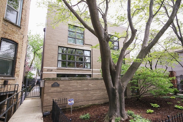 REMODELED all-brick, open-concept 3 bed, 3 bath townhome-style condo with a wood burning fireplace, private rooftop deck, and 2 tandem parking spaces, located in the heart of Lincoln Park just steps from a top Michelin-starred restaurant. The main floor features a spacious kitchen with a top-of-the-line Viking stove, all appliances included, and a custom-built dining booth with table. Beautiful refinished hardwood floors and high-quality windows fill the space with natural light. The primary suite includes ample closet space, a private bath with double vanity and custom shower, along with new countertops, mirror, lighting, and freshly painted cabinets (2022). Two additional bedrooms share a nicely updated guest bath. The spectacular private rooftop deck (owned by the unit) was upgraded in 2023 with new maintenance-free decking and replaced sheathing; the building roof is maintained by the association. Additional updates include a new water heater (2022), furnace (2021), washer/dryer (2018), brand new microwave (2025), newer bedroom carpeting, and fresh paint throughout. In-Unit Laundry. Located near top restaurants, shopping, and theaters. Pets Allowed. Exterior rooftop furniture is available for sale, and a 13-month home warranty is offered.