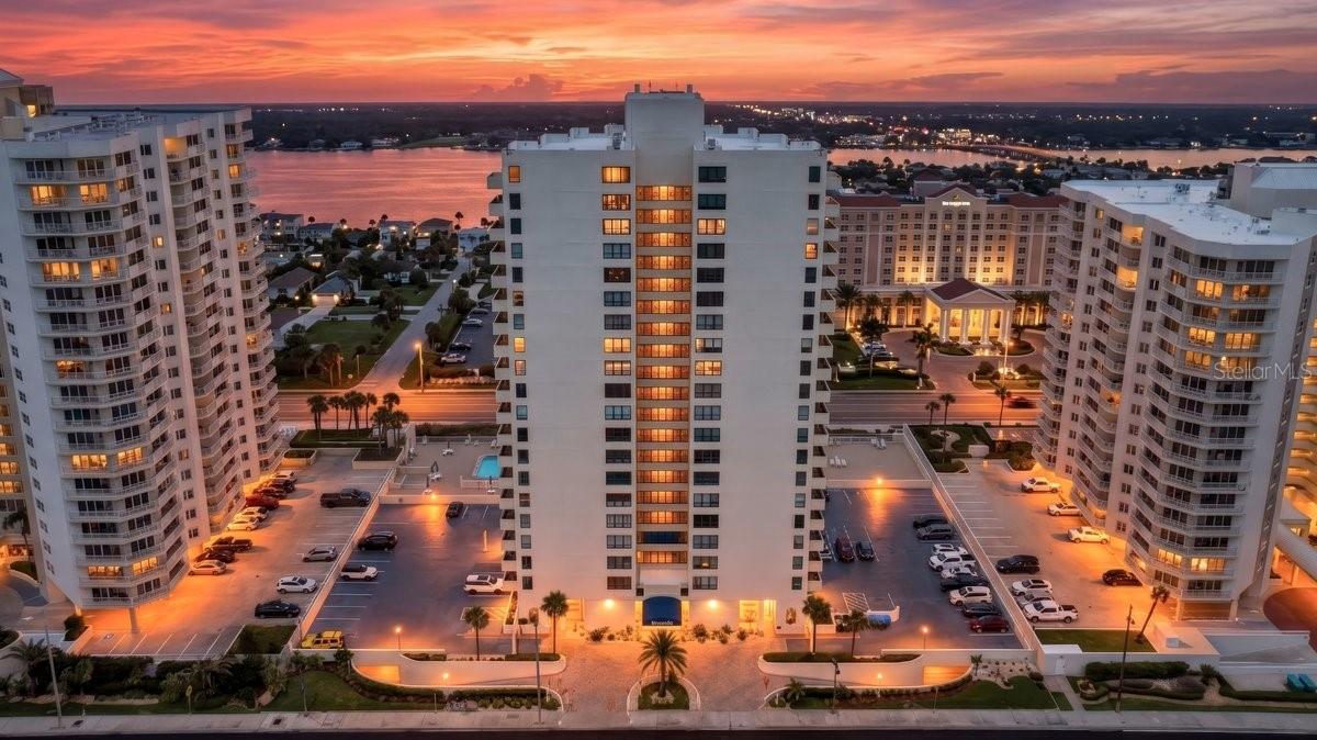 Ocean-to-River Views in Fully Remodeled Oceans Seven Condo. Wake up to the shimmer of the Atlantic and unwind each evening with glowing riverview sunsets from this beautifully updated 2-bedroom, 2-bath residence at Oceans Seven in Daytona Beach Shores. With rare dual water views, this condo captures the full coastal experience, from the sound of waves rolling onto the shore to boats drifting quietly along the river. Floor-to-ceiling natural light fills the living spaces, creating an airy, relaxed atmosphere that instantly feels like vacation. Thoughtfully remodeled in 2025, the interior blends modern comfort with effortless coastal style. Luxury vinyl flooring with a realistic wood finish flows throughout the entire home, complemented by newer stainless steel appliance package and refreshed finishes designed for easy living. In 2024, impact-resistant windows and sliding glass doors were installed, offering added peace of mind, energy efficiency, and protection while framing the stunning views.A rare standout feature in this unit is the private in-unit washer and dryer, bringing everyday convenience Oceans Seven Condo simply does not offer. The building does not allow pets.Whether you're searching for a full-time beachfront residence, or seasonal escape, this updated Oceans Seven condo delivers exceptional value and lifestyle. Schedule your private showing and experience these ocean-and-river views for yourself.Perfectly positioned in the heart of Daytona Beach Shores, Oceans Seven places you just minutes from waterfront dining, shopping, golf, marinas, and local entertainment while still offering the quieter, more residential feel that makes this coastal community so desirable. Residents love Daytona Beach Shores for its wide, beautifully maintained shoreline, and relaxed atmosphere that feels removed from the crowds without sacrificing convenience. From sunrise walks on the sand to evenings spent exploring nearby restaurants and riverfront spots, this location delivers the best of Florida coastal living with everything close at hand.