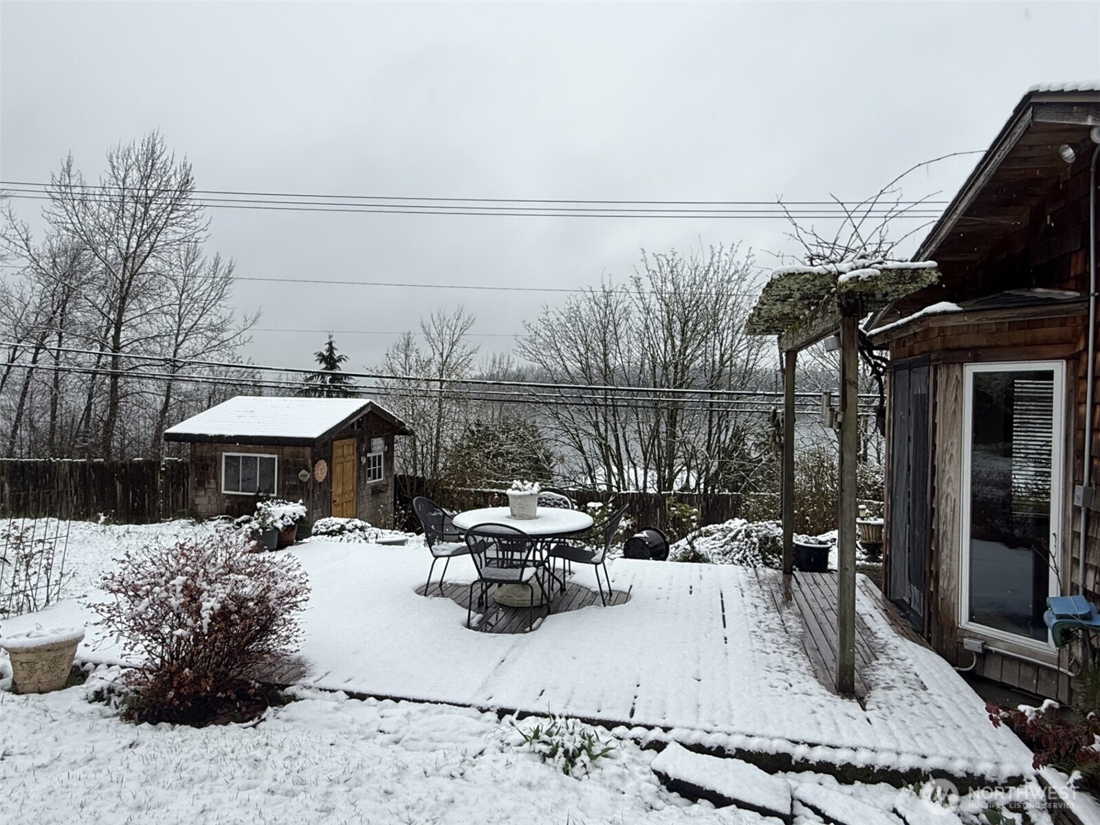 On the land, and over at the nearby beach, relax and enjoy this high value view, large .7 acre lot with charming 1904 farmhouse. Includes a private shared beach on Lake Sammamish with dock moorage. Current owner (from 1987 to now) is only the 3rd owner.