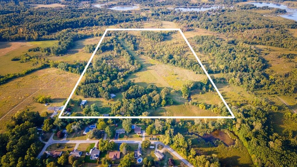 First time on the market in over 50 years! This well-maintained 1860s-era 4 bed, 2 bath farmhouse sits on 80 stunning acres in Jackson County, MI. Enjoy a mix of high and low ground, small pond, trails, and abundant wildlife--perfect for private aviation, hunting, recreation, or hobby farming. Features include a full basement, 2-car garage, classic barn, garden shed, workshop, and a private aircraft hangar with a grass runway (or potential food plot).The bones of this home are solid, with a newer roof and updated mechanicals Natural gas and electric on-site. Beautiful park-like setting with great views from the back deck. Although the property feels like a private retreat miles from civilization, it's conveniently located not far from town and local amenities. Easy access to groceries, shopping, dining, schools, and healthcare, all within  reasonable drive--but with all the peace and privacy of rural living.  Rare opportunity with endless potential! Possession of home & bldgs Negotiable