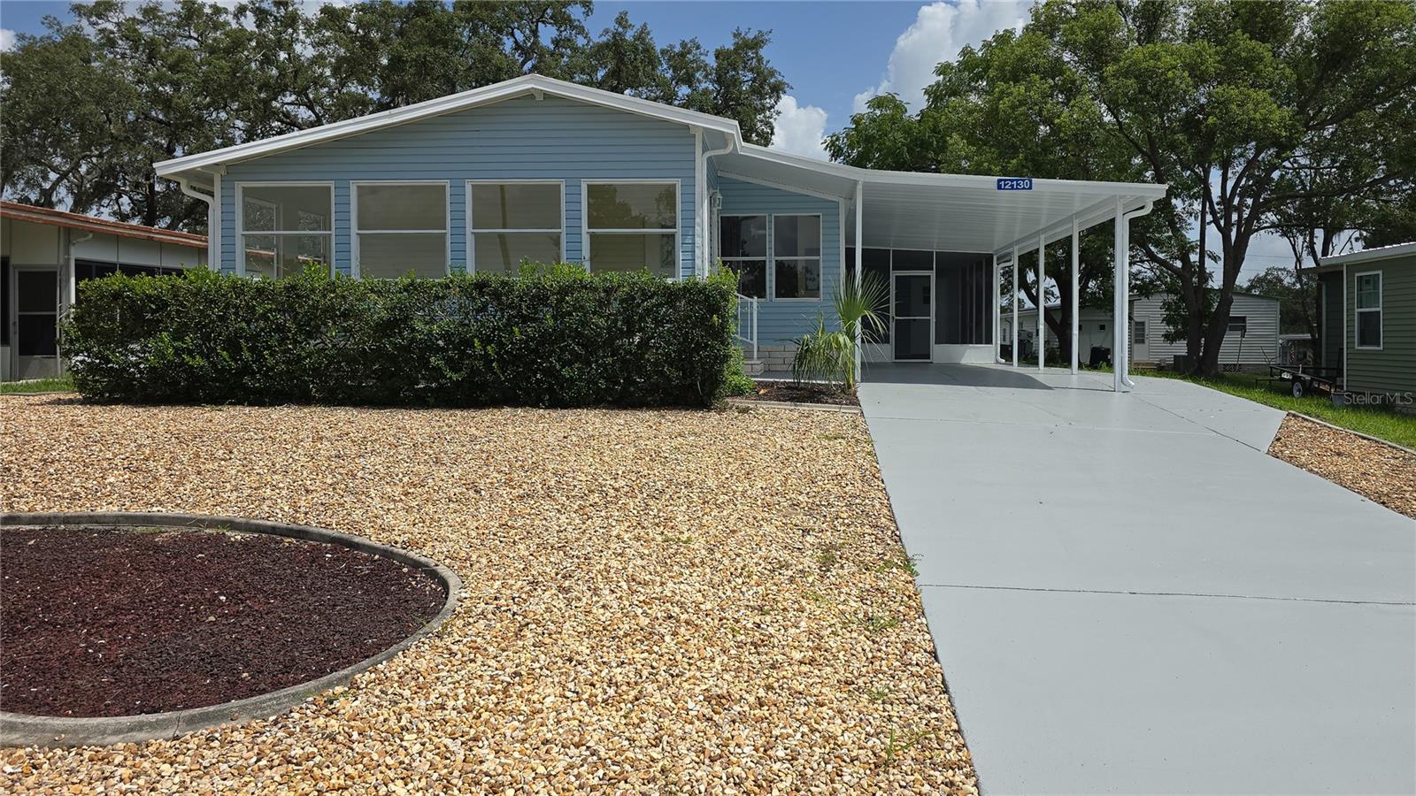 Step into this FULL RENOVATED 3-BEDROOM, 2-bath home featuring brand new LVP hybrid flooring and trim throughout, ALL NEW DESIGNER FIXTURES, LED LIGHTING, and fresh interior paint. The expansive kitchen is a chef's dream, offering an abundance of ALL WOOD/SOFT CLOSE cabinets, ample counter space, a pantry, and BRAND NEW APPLIANCES. Cathedral ceilings enhance the bright, open feel of the home, while the GLASS ENCLOSED & TILED Florida room provides the perfect spot to relax or entertain. Enjoy the convenience of an INSIDE LAUNDRY and the curb appeal of a FRESHLY PAINTED EXTERIOR AND DRIVEWAY. ROOF INSTALLED 2015 HVAC INSTALLED 2016 NEW WATER HEATER 2025 RE-PLUMBED 2025 (NO GRAY PIPE) Ask your agent about the SELLER-OFFERED 2-YEAR HOME WARRANTY. Located in the vibrant High Point Golf Community, this home offers resort-style living in a friendly, active 55+ neighborhood. The High Point Community offers tons of amenities such as Golf, tennis, pickleball, heated pool, social events and so much more. High Point is located close to shopping, restaurants, entertainment, and medical facilities. Low HOA fees and you OWN YOUR OWN LAND.Don't miss this move-in-ready opportunity!