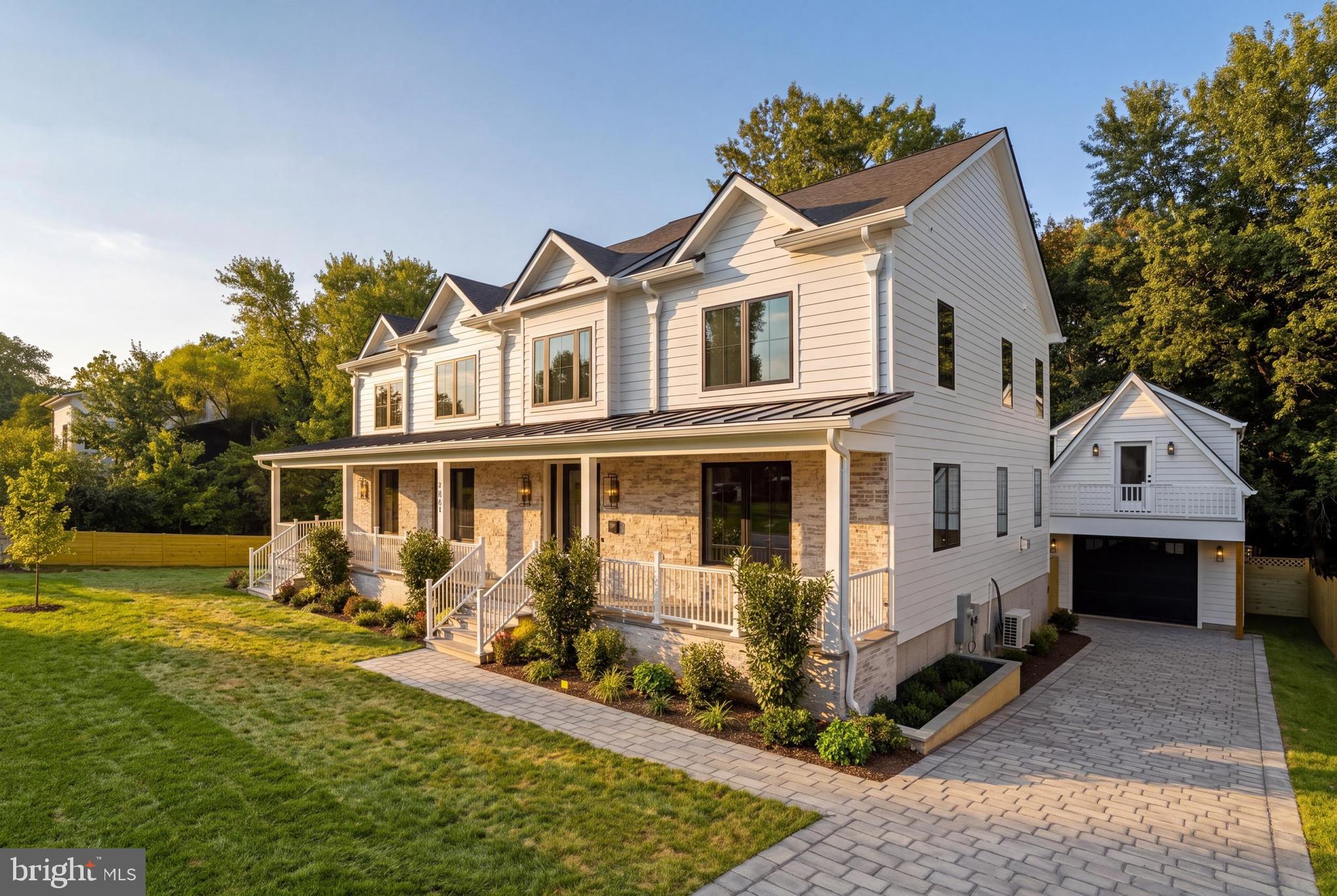 Welcome to a stunning new construction home in Arlington County steps from the metro infont of parkland. This expansive residence spans over 6200 square feet across three finished levels, boasting 6 bedrooms, 6 full baths, 2 half baths, 2 fireplaces, and an accessory dwelling/guest house above the oversized garage. Approaching the home, you're greeted by a striking facade blending white-washed red brick and pristine white hardiplank, complemented by sleek black window frames and gutters. A landscaped front yard leads to a covered porch with recessed lighting and ceiling fans, setting a welcoming tone. Inside, the foyer impresses with natural light pouring through expansive windows, illuminating gleaming white oak flooring that extends throughout. Details like 7" baseboards, recessed lighting, custom fixtures, and a state-of-the-art speaker system enhance the sophisticated ambiance. To the right of the foyer, glass doors open to a spacious office with a ceiling fan, ideal for work or reflection. To the left, a formal dining room accommodates 8-10 guests, perfect for entertaining. The heart of the home is the chef’s kitchen, featuring double islands with breakfast bars, custom pendant lighting, and two-tone shaker cabinets. It's equipped with two dishwashers, two sinks, a 42" gas range, pot-filler, microwave, and striking white quartz countertops with grey veins. Adjacent, the breakfast area flows into a large living/family room highlighted by a marble gas fireplace. French doors lead from the family room to a spacious Trex deck with outdoor lighting and speakers, overlooking a private backyard with lush greenery—a serene retreat. The main level also includes a thoughtfully designed half-bath and a mudroom with full-size washer and dryer, shaker cabinets, sink with disposal, and built-in storage bench with hooks. A glass entry door provides easy access to the rear. A large in-law suite with private entrance features a double closet, Sonos speakers, ceiling fan, and luxurious en-suite bath with marble vanity and spa shower. Ascending the staircase, custom picture frame molding lines the hallway leading to bedrooms with recessed lighting, ceiling fans, and additional amenities like a secondary washer and dryer. The master suite offers a tray ceiling, Sonos speakers, marble gas fireplace, walk-in closet with custom built-ins, and a luxurious spa-like bathroom with skylights, marble accents, soaking tub, and glass door spa shower with dual heads. Two generous bedrooms each boast walk-in closets and lavish baths, while two additional bedrooms share a large Jack and Jill bath. The fully finished basement features luxury vinyl flooring, recessed lights, Sonos speakers, and ample storage. A wet bar with quartz countertops and subway tile backsplash is perfect for entertaining, along with a movie room equipped for cinematic experiences. A half bath, bedroom with full bath, and finished storage room complete this level. An oversized one-car garage with a long driveway accommodates multiple vehicles, with an accessory dwelling/guest house above. This space includes a bedroom set, full bath, galley kitchen with appliances, utility closet with washer/dryer, and separate water heater and furnace. Meticulous attention to detail is evident throughout, from architecture and designer finishes to paint, flooring, moldings, cabinetry, fixtures, and utilities. This dream home blends luxury with convenience, offering proximity to shopping, dining, parks, and transit, including easy access to Pentagon, Amazon HQ2, Reagan National Airport, and Downtown D.C. Enjoy residing in a quiet neighborhood with access to 66, Falls Church Metro and VRE, and the shops Shopping Centre. Don’t miss this rare opportunity to own an exceptional home in a prime location on a wide lot backing to park land!