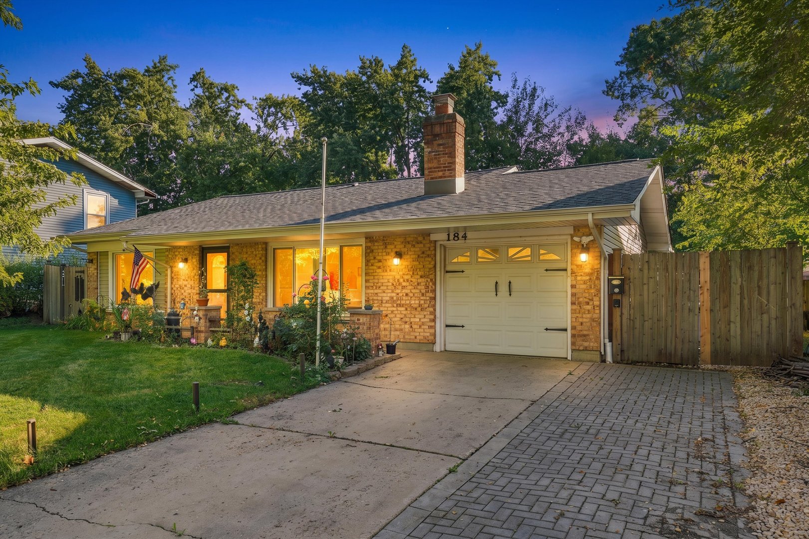 Don't miss the opportunity to be the proud owner of this beautifully updated 3 bedroom home in an appreciating Bolingbrook neighborhood. The current owners have tastefully updated this home with custom high end finishes that you won't find in all the other cookie-cutter rehabs. Owners were making this their forever home and so they designed and invested into this home with high end materials   Their great taste is especially evident in the kitchen and dining area, featuring custom wood cabinetry, quartz countertops, beautiful porcelain backsplash, Samsung Bespoke appliances, custom high-end lighting, updated plumbing and mini fridge.  You'll love the kitchen which features ample countertop space and plenty of cabinet space with an amazing open concept flow that blends perfectly to the dining room and living room.  Beautiful custom built-in cabinet offers additional storage space and ties the space together. Additional updates include new luxury flooring, new lighting and doors throughout, along with a completely remodeled laundry room. The sunroom and garage feature terrazzo flooring and with tons of windows. The entire home has incredible natural sunlight! Spacious bedrooms, large living room, and a beautiful fireplace. Brand new electrical service upgrade with newer electrical throughout. Mechanical improvements include a new AC unit, new furnace coil pack and an EV outlet (14/50R). You'll love the large backyard which is perfect for entertaining friends and family.  Yard features a new all brick paver patio and custom fire pit perfect for those summer nights. The exterior has been thoughtfully updated with a newer roof and gutters, followed by new siding and soffits. Newer fence, new attics fans, new landscape lighting and flood lighting. .  A meticulously updated home with beautiful finishes and improvements that make a difference. Home is centrally located near schools, shopping, commercial corridors and highways! Huge lot and low taxes! Don't miss out on the opportunity to make this amazing home yours!