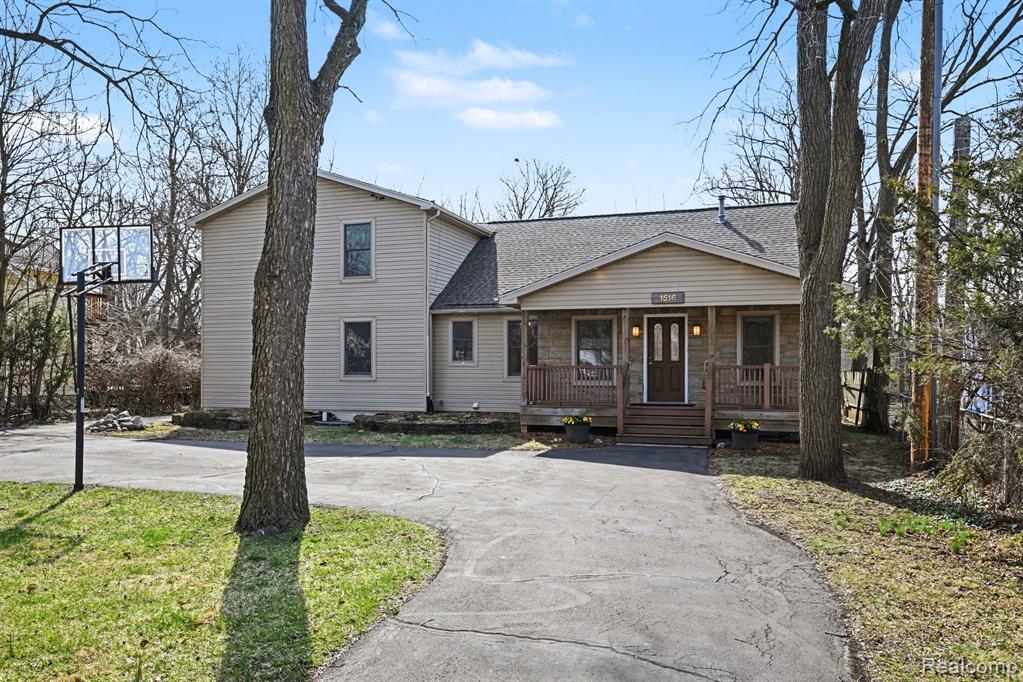 Welcome to this beautifully maintained home in Ann Arbor, ideally located near shopping, dining, parks, and all the amenities that make the area so desirable. Offering exceptional flexibility, this property can be enjoyed as a spacious single-family residence or configured for two separate living spaces—perfect for a variety of living arrangements or investment opportunities.The main level features fresh paint, abundant natural light, and a warm, inviting layout. The kitchen is outfitted with granite countertops and stainless-steel appliances, blending style and functionality. Generously sized bedrooms throughout the home include oversized closets, and the property offers four and a half baths for added comfort and convenience.The lower level includes a fully equipped apartment with its own private entrance and egress windows, creating a bright and spacious two-bedroom living area complete with a full kitchen and bathroom. This setup provides excellent flexibility for extended living arrangements, guest accommodations, or rental income potential.Situated on nearly half an acre, the expansive lot offers plenty of room for outdoor enjoyment, gardening, or future improvements such as a garage or accessory dwelling unit (ADU). There may also be potential to explore a lot split (buyer to verify). Home Energy Score may be viewed on Stream A2 gov websiteSome of the properties highlights are New roof, Large, light-filled living spaces, Flexible floor plan for single-family or duplex-style living, Ample storage throughoutThis property presents a unique opportunity to enjoy space, versatility, and location all in one.Schedule your private showing today to explore all the possibilities this Ann Arbor home has to offer!