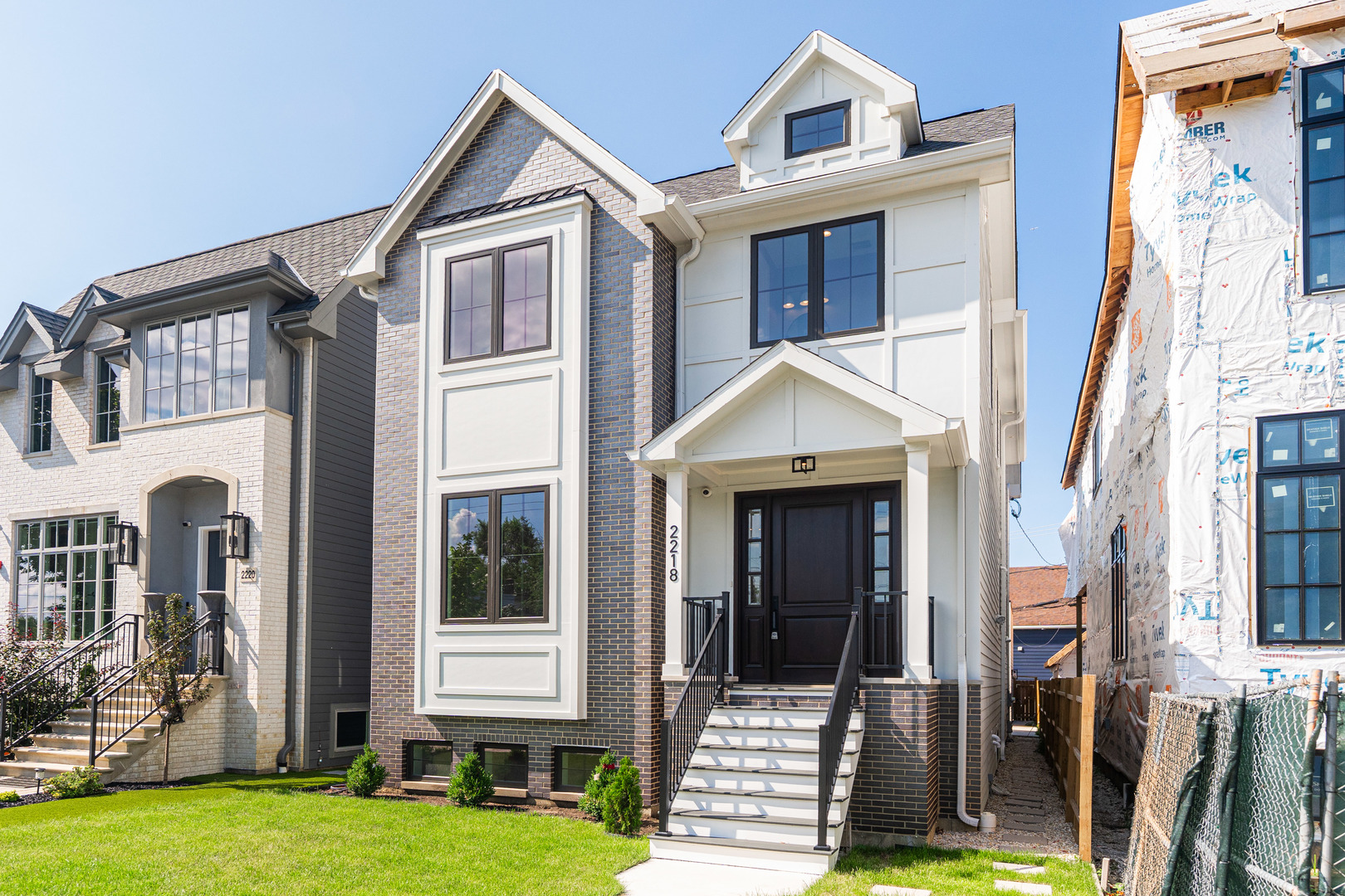 MOVE-IN READY! This 4,490 sq. ft. new-construction home on a rare oversized lot in vibrant West Town, steps from Hamlin Park, shines in a neighborhood buzzing with new builds. With 6 bedrooms (4 upstairs), 4 full baths, 2 half baths, and a 2.5-car garage prewired for EV charging, it's ready for you today. Enjoy 10-ft. ceilings, recessed lighting, and premium finishes throughout. The chef's kitchen dazzles with Thermador appliances, quartz countertops, a touchless faucet, under-cabinet lighting, and a walk-in pantry. Entertain on two spacious outdoor spaces-a garage-top deck and a family-room-connected patio-perfect for the expansive lot. Relax by two fireplaces or in the primary suite, featuring a private balcony, dual walk-in closets, and a spa-like bath with a soaking tub, steam shower, and heated floors. The lower level, with radiant heat, offers a rec room prewired for a home theater, a wet bar, 2 bedrooms with a Jack-and-Jill bath, and extra storage. Tech-ready with high-speed internet and a multi-room sound system, this home is near Hamlin Park, a local dog park, river trail for hiking, canoeing spots, and West Town's trendy dining. Owner is a licensed real estate broker.