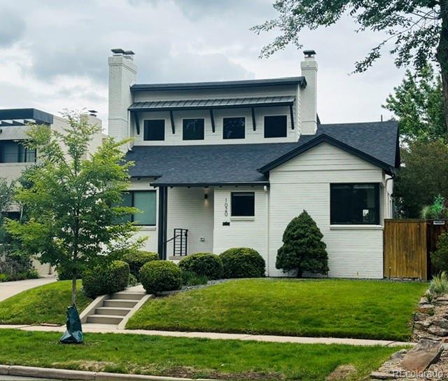Completely remodeled and perfectly positioned in one of Denver’s most coveted neighborhoods, this exceptional Bonnie Brae home offers the ideal blend of timeless character, modern luxury, and an unbeatable walkable lifestyle.Step inside to an inviting open-concept floor plan featuring soaring vaulted ceilings, beautiful natural hardwood floors, and a cozy wood-burning fireplace. Sunlight fills the stunning chef’s kitchen with white shaker cabinetry, striking Cappuccino Blanco quartz countertops with a waterfall island, stainless steel appliances including a gas cooktop, breakfast bar, and dining nook.The thoughtfully designed layout offers two main-level bedrooms and a beautifully updated full bath—perfect for guests, a home office, or growing families. Upstairs, the private primary retreat features its own balcony overlooking the lush backyard, a spa-inspired ensuite with dual vanities and designer stone shower, and an oversized walk-in closet with custom built-ins.The finished lower level expands the living space with a spacious family room, an additional bedroom with its own fireplace, a beautifully appointed bath with a walk-in tiled shower, and a generous laundry room with utility sink and abundant storage.Outside, the professionally landscaped backyard offers a private oasis with mature gardens and a covered patio with ceiling fans—perfect for entertaining or relaxing on Colorado evenings. Extensive updates include newer HVAC, electrical, plumbing, windows, new carpet, new interior paint, and 2 new 65” TV’s. A detached two-car garage and extended driveway provide ample parking.The location is simply unmatched. Walk to Bonnie Brae Ice Cream, Whole Foods, Devil’s Food Bakery, Homegrown Tap & Dough, Perdida, Washington Park Social, Agave Taco Bar, and South Gaylord’s renowned shops, with Washington Park and Cherry Creek just minutes away.Bonnie Brae living at its finest—where classic neighborhood charm meets sophisticated modern design.
