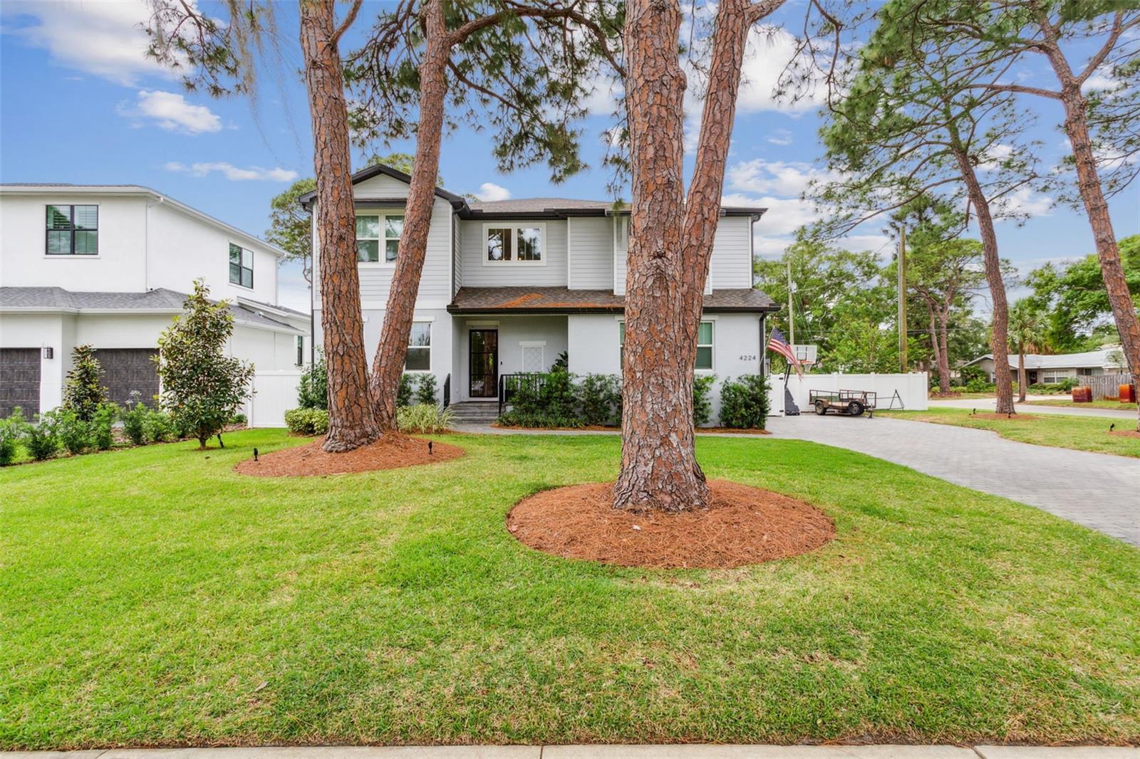 Fresh price - Motivated Seller! Rare opportunity in South Tampa!

 Welcome home to your large corner lot & dream home in the heart of South Tampa in the Mabry|Coleman|Plant school district.  

ELEVATED, NO DAMAGE from recent hurricanes.  

Large corner lot is 9,450 SqFt.  
Square footage of the home is 3,966 under air and 4751 total sq footage.  

This stunning 5-bedroom, 5-bathroom, office, bonus room, pool & spa home, built by M. Ryan Homes in 2020, is a masterpiece of modern luxury and thoughtful design. Step inside through the custom metal front door and immediately feel the elegance of light European Oak wood floors that flow seamlessly throughout the home.

The grand great room opens to an inviting chef’s kitchen, complete with a Sub-Zero refrigerator, GE Café Profile gas appliances, 2 Marvel beverage fridges, and a large island perfect for entertaining. Adjacent is a separate dining room featuring a custom wine racking system—a true showpiece for wine enthusiasts.

A private downstairs guest suite and a separate office provide flexibility, while upstairs you’ll discover a spacious bonus room, laundry room, and three additional bedrooms, all with ensuite bathrooms and walk in closets.  Also upstairs you will find the luxurious master suite which boasts a spa-like bathroom with dual vanities, a soaking tub, and a large walk-in shower. Two master walk-in closets designed with custom drawers and shelving to keep your wardrobe as impeccable as this home.

Step outside to your personal paradise: a heated pool, spa and bubbler features, surrounded by a large patio with stunning natural stone herringbone pavers. The professionally designed landscape and outdoor lighting create a serene and private escape, while tongue-and-groove wood ceilings on the front and back porches add a touch of elegance.

Additional features include a two-car garage with custom shelving and storage racks, a tankless gas water heater, Tesla charging port, smart home technology with hardwired speakers, and custom window treatments on windows.

Located just minutes from downtown Tampa, TIA, Hyde Park, top-rated restaurants, shopping, and sports venues, this home offers luxury living with unbeatable convenience. Schedule your private tour today—this one won’t last long!