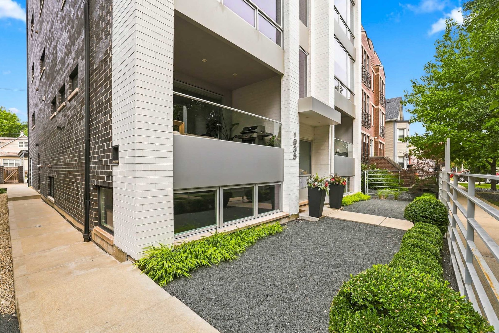 Space, separation and a rare townhome-style layout set this nearly 2,000-square-foot, 3-bedroom, 3-full-bath duplex apart. Two bedrooms and two full baths, including the primary suite, are conveniently located together on the main level, while the lower level offers an expansive second living space with a wet bar, third bedroom and third full bath.    The main level features an open-concept living and dining area and a modern kitchen with European cabinetry, quartz countertops, Bosch appliances and a waterfall island. Two private balconies extend the living space outdoors, with a direct gas line on the front balcony for easy grilling and entertaining.    Downstairs, the spacious family room and wet bar create a true second living and entertaining space, with plenty of flexibility for a media room, playroom, home office or workout area. A separate third bedroom and full bath make this level equally well suited for guests or additional privacy.    Additional highlights include an attached heated garage space and extra storage, all within a boutique eight-unit masonry building completed in 2017.    Ideally located at the crossroads of Logan Square, Bucktown and Wicker Park, with a neighborhood grocery market just steps from your door, convenient access to the Blue Line, the 606 and Humboldt Park, plus the area's restaurants, coffee shops, shopping and everyday conveniences.