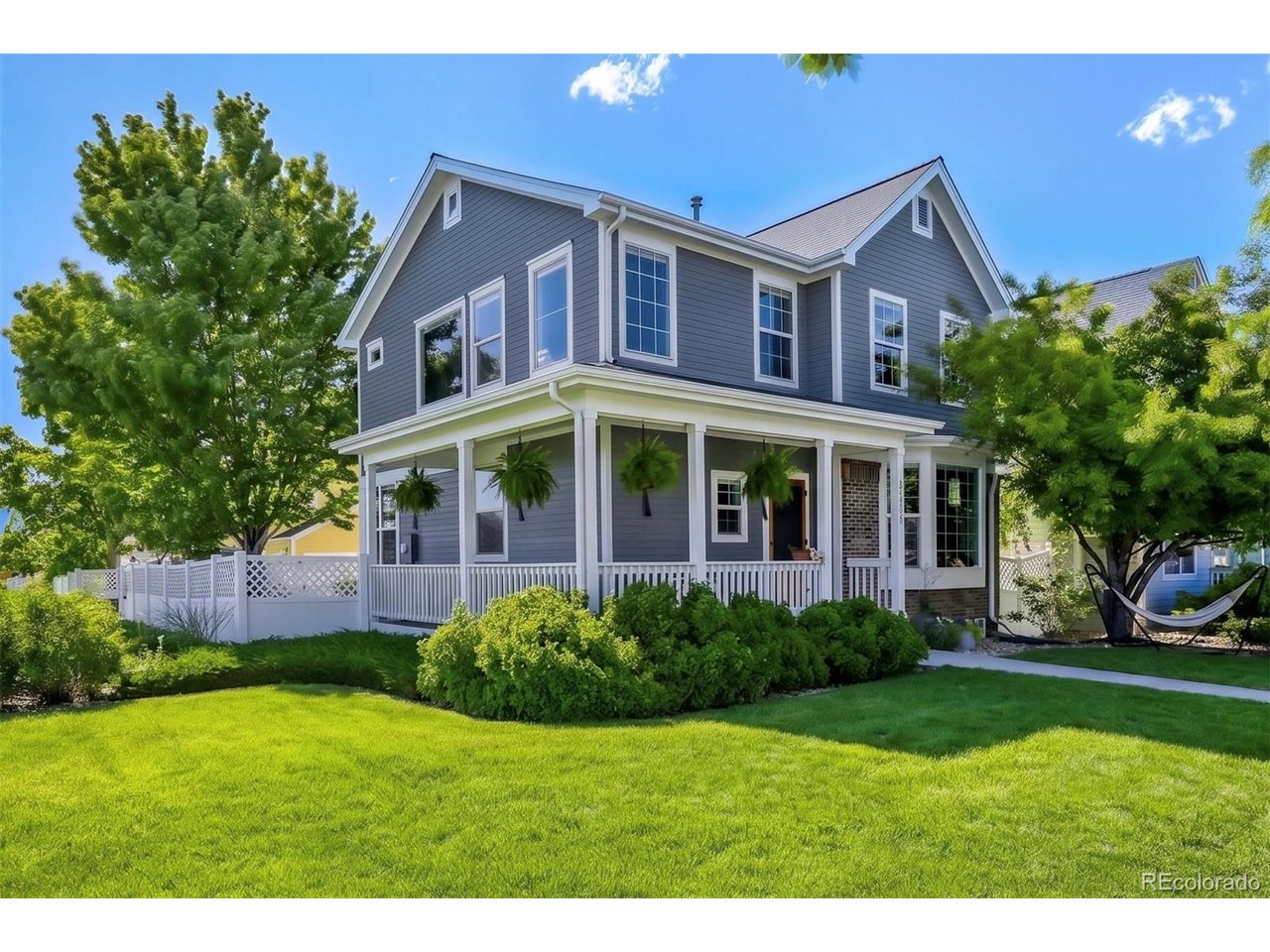 Visit PropertyPage.io/8313-coors-court-arvada-co for complete property information including market report, CMA, seller disclosures, virtual tour, photos, and the ability schedule a tour or to make a SimpleOffer.Tucked at the end of a quiet street in the highly sought-after Village of Five Parks, this beautifully reimagined 3-bedroom, 3.5-bath home sits on a rare end lot bordered by an HOA-maintained open space, giving the property a generous side yard with none of the upkeep. From the wrap-around front porch and expansive back patio, you'll take in some of the best unobstructed mountain and Denver skyline views in the neighborhood, day and night.Nearly every space in this joyful home has been thoughtfully updated, to include a fully remodeled kitchen, flooring, paint (inside and out), updated lighting, fixtures, and trim, and top-down/bottom-up window shades that balance privacy and light. The finished basement adds flexible living with a stylish wet bar made for entertaining, and the back patio was redesigned to make the most of the panoramic views.The HOA covers all grounds maintenance and snow removal right up to your front porch - true lock-and-leave living. Walkable to Lot One, the Village Center, top-rated schools, parks, pool, and trails, with easy access to Standley Lake, I-70, downtown Denver, and the mountains.This is Colorado living at its finest - views, lifestyle, strong community, and a truly hard-to-find lot, all in one exceptional home.