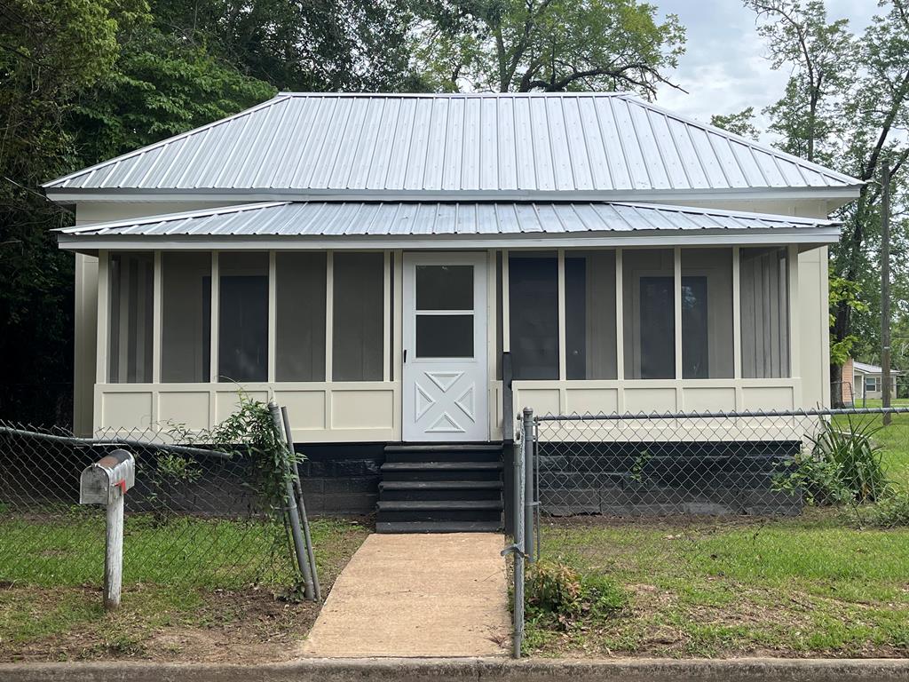 Welcome home to this remodeled 2 bedroom, 1 bath home situated on a  corner lot in Thomasville! The inviting screened front porch would be the perfect place to enjoy your morning coffee or unwind after a long day. Inside, you'll find a space that's warm and welcoming. The functional floor plan offers comfortable living spaces that are move-in ready and ideal for first-time buyers, downsizers, or anyone looking for a home. Step outside to enjoy the fenced yard with plenty of parking. The new metal roof and mini split system are just a few of the many renovations to this home. Situated on a corner lot, this property provides added curb appeal and extra outdoor space. Don't miss your opportunity to own this beautifully updated home that's ready for its next chapter. Schedule your private showing today!