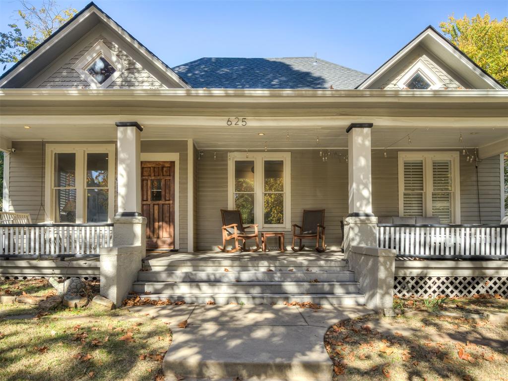 Located on 16th Street in Mesta Park, one of OKC’s most sought-after and family-friendly neighborhoods, this beautifully restored 1919 home sits on an impressive 2.5 lots, offering rare space to grow in the heart of the city. Renovated in 2021 with a brand-new HVAC system installed just three months ago, the home balances historic charm with modern updates.A wide covered front porch opens into a comfortable layout with a welcoming family room, an adjacent office, and a dining room connected to the kitchen. French doors lead out to a patio and an oversized backyard—perfect for kids, pets, entertaining, or future expansion. The kitchen features custom cabinetry, soapstone countertops, a farm sink, and an AGA Professional gas range. Two bedrooms and a full bath are located on the main level, while the primary suite is tucked away upstairs for added privacy. In total, the home offers 3 bedrooms, 2 bathrooms, and a dedicated office/study.With 2.5 lots, there’s plenty of room to add on, and the existing garage could easily be converted into an ADU. Opportunities like this—ample space, flexibility, and a true neighborhood feel—are rare in Mesta Park.