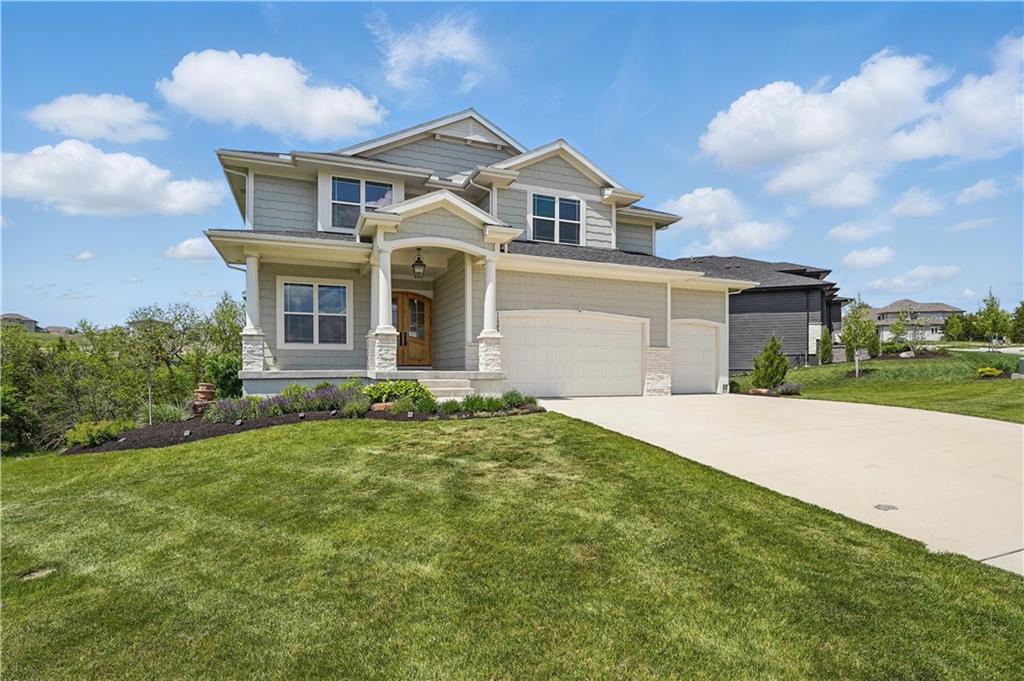 Award winning selections in Cedar Creek! Do you want a new home without the stress or the wait that goes with new construction? This is your chance! This is a rare opportunity to own an award-winning Gabriel Homes - Makenna 2 story that is less than 2 years old. Sitting on one of the best lots in Valley Ridge — backing to a beautiful, treed greenspace. It’s better than new, with the highest of finishes throughout! 
Step inside through the stunning double door entry into the main floor featuring 10-foot ceilings throughout. The main level office has been upgraded with custom built-ins along with double glass French doors. The expanded great room showcases a large gas fireplace with custom built-ins on either side, coffered ceiling treatment, and a wall of windows featuring upgraded wainscotting. The gourmet kitchen is every chef's dream, featuring beautiful floor to ceiling cabinets, a high end gourmet gas range, a huge walk-in pantry with a grocery pass-through, and an expanded island, perfect for entertaining. Off the main living area, you’ll find a covered deck that looks out over the trees, ideal for your morning coffee or evening relaxation. 
Upstairs, the primary suite is absolutely incredible. It’s oversized with a huge walk-in closet and has a bonus closet perfect for seasonal clothing or secure storage. The primary suite bathroom feels like your very own spa with heated tile floors, double vanities, a luxurious soaker tub, and a large shower with his and her sides. Every detail on this home has been meticulously selected!
Cedar Creek features a 65 acre private fishing/canoeing/kayaking lake. 3 resort-like swimming pools, a 2 story clubhouse with NBA basketball grade court that is also set up for year round pickleball or volleyball, several outdoor tennis and pickleball courts, sand volleyball court, along with miles of walking trails! Come see why Cedar Creek is one of the most sought-after communities to call home in Johnson County!