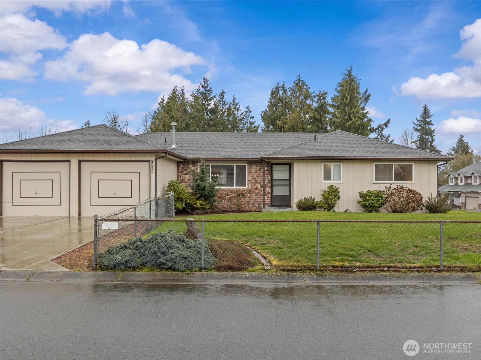 Set on a spacious corner lot in a quiet neighborhood, this one-story home offers a layout that just makes sense for how people live today. Inside, you’ll find a fresh remodeled interior with clean, modern finishes that make it easy to move in and start enjoying the space right away, without a long to-do list hanging over your head. With two separate living areas, you’re not stuck trying to make one room do everything. Whether it’s creating a dedicated TV space, a play area, or a work-from-home setup, you’ve got options. The primary bedroom includes its own ¾ en-suite with a nicely tiled shower, giving you a bit of separation and privacy, while the additional bedrooms are comfortably sized for guests or an office. A lot of the big-ticket items have already been taken care of, too. The home features a newer HVAC system and AC, things you won’t have to worry about anytime soon. Out back, the covered patio extends your living space outdoors and makes it easy to enjoy the yard year-round. And with the home sitting on a large corner lot, you get way more space. Including RV/Boat parking! Location-wise, you’re in a convenient spot with quick access to Kent Station, major commuter routes like Hwy 167 and I-5, and everyday essentials just a short drive away. Overall, this is a home that checks the boxes you actually care about: updated, functional, and with enough space to grow into. Too many features to name. You'll want to see this in person!