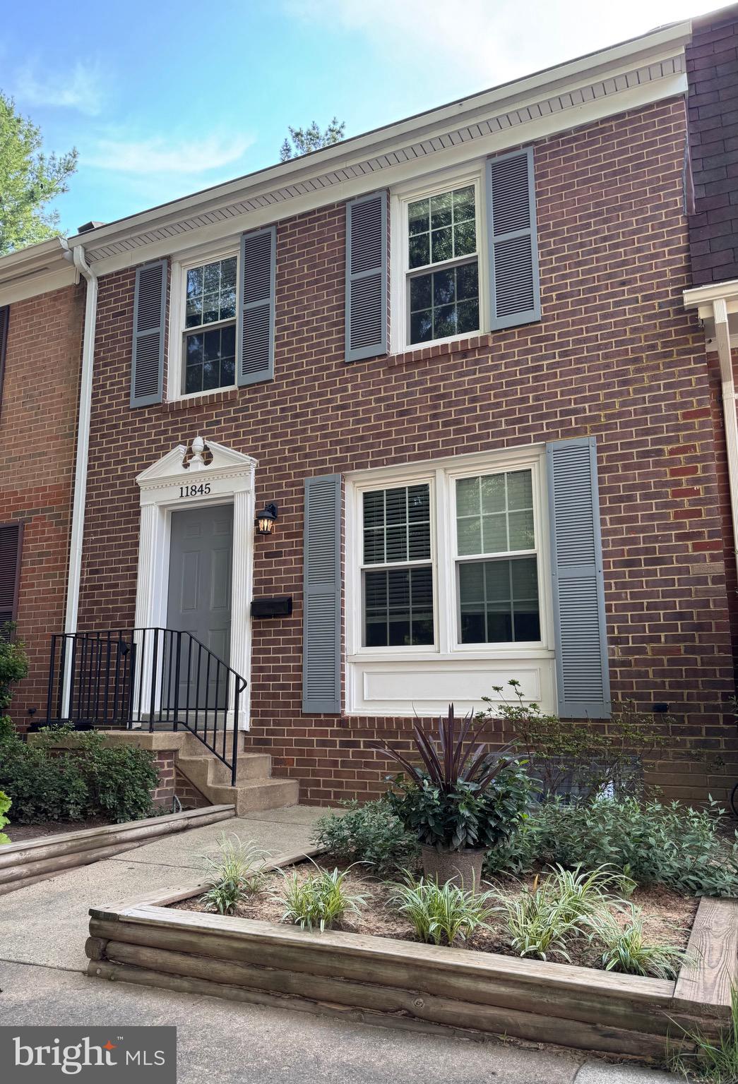 Beautifully maintained and ideally located on a quiet street in the heart of the neighborhood, this home offers the perfect combination of comfort, style, and convenience, just minutes from all that Reston has to offer.Hardwood floors span the entire main level, flowing seamlessly from the updated kitchen through the dining room and into the spacious living room. Soaring 12-foot ceilings and a large sliding glass door create an open, airy atmosphere and fill the living space with natural light. Step outside onto the rear deck and enjoy a peaceful, private setting with no homes directly behind you.Hardwood floors continue throughout the bedroom level, where the spacious primary suite features an updated bathroom and walk-in closet. Two additional bedrooms and a full bathroom complete the upper level.The lower level provides flexible additional living space and has been refreshed with brand-new carpet installed prior to listing, along with fresh paint throughout.Move-in ready and thoughtfully updated, this home is ideally situated to enjoy the best of Reston while offering a quiet and private place to call home.