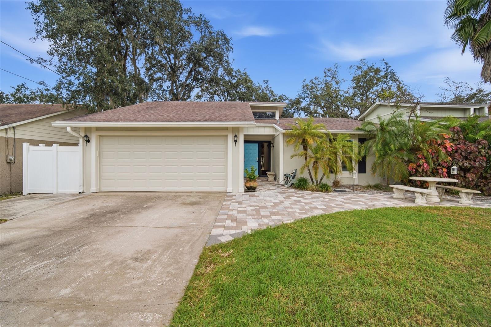 Exterior photo: Updated home with a two-car garage in Tampa