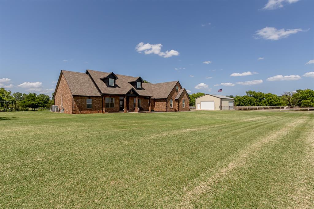 Located in the Moore School District and just 20 minutes from Downtown OKC, Tinker AFB, and Norman, this exceptional property offers the space, flexibility, and lifestyle you've been searching for. Enjoy peaceful lake views and the freedom of owning horse property, all while staying close to the city. Situated on two acres(MOL) with no HOA restrictions, this 5-bedroom home is designed for both everyday comfort and unforgettable gatherings. The open-concept layout seamlessly connects the oversized living room, spacious dining area, and beautiful kitchen featuring granite countertops, abundant cabinet and countertop space, a large island with seating, and a generous pantry. Natural light fills the home, while durable flooring throughout the main living areas means no carpet where it matters most. The private primary suite is a true retreat with direct access to the extended back patio overlooking peaceful water views, along with a spa-inspired ensuite featuring a jetted tub, walk-in shower, dual vanities, private water closet, and oversized walk-in closet. A dedicated office on the main floor provides the perfect work-from-home space, while the upstairs loft offers endless possibilities as a game room, media room, reading nook, or creative studio. Four additional bedrooms ensure room for family and guests alike, and the oversized laundry room adds everyday convenience. Step outside to enjoy the beauty and versatility of this incredible property, complete with a 30x40 shop, extended patio for entertaining, and fenced pasture with a lean-to ready for your animals. The agricultural zoning is a rare advantage, allowing livestock and providing opportunities that many neighborhoods simply can't offer. Whether you're dreaming of hobby farming, extra storage for recreational vehicles, or simply enjoying wide-open spaces without restrictive HOA rules, this property delivers a blend of privacy, functionality, and convenience that's difficult to find today. Don't miss this one!