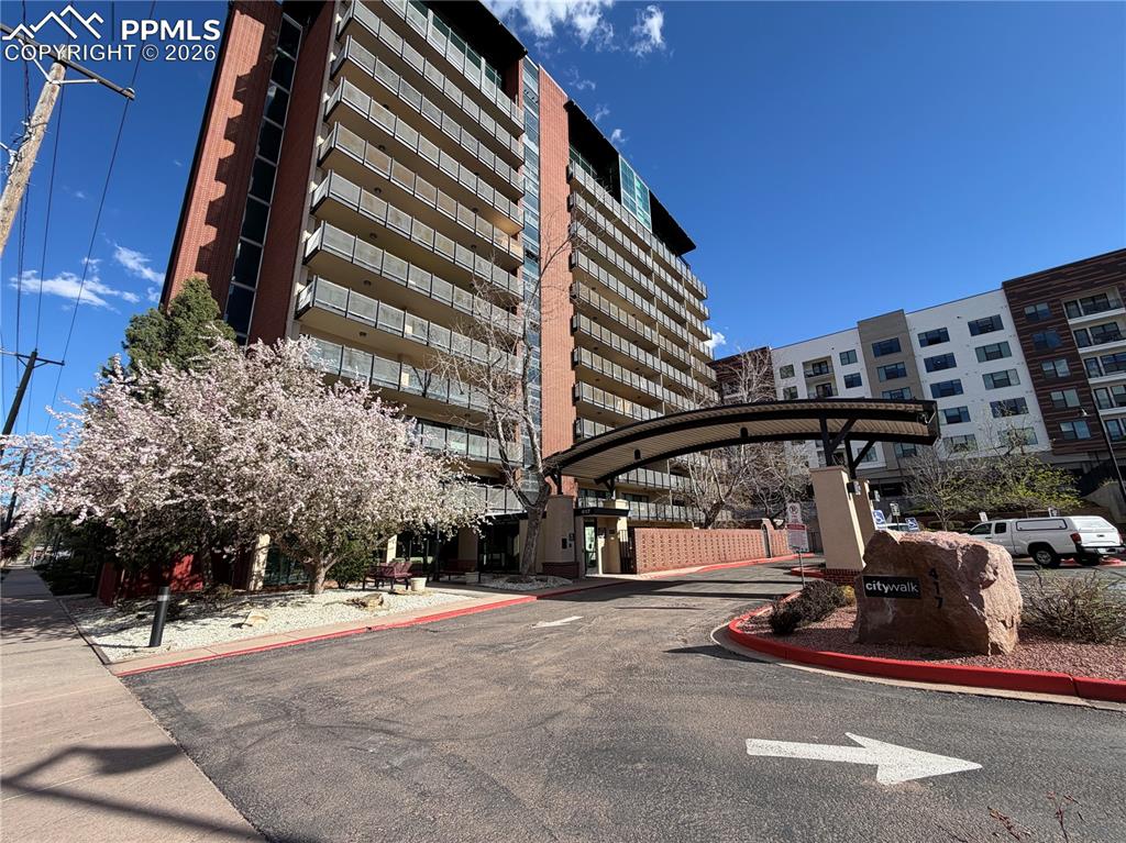 This standout second-floor 1-bedroom, 2-bathroom condo offers one of the best layouts in the community, featuring a detached garage and two assigned parking spots. The bright, open-concept design has been nicely updated throughout. The kitchen shines with granite countertops, modern finishes, and an inviting feel that makes it a pleasure to cook and entertain. The spacious primary suite includes a private attached bathroom, and the living area opens to a generous balcony—perfect for relaxing or enjoying the views. Residents enjoy excellent community amenities, including a pool, fitness center/gym, and comfortable common areas. Located just outside downtown Colorado Springs, this home provides convenient access to all the dining, entertainment, and attractions the city center has to offer. A rare combination of space, updates, parking, and location—don’t miss this one! Dues include utilities.