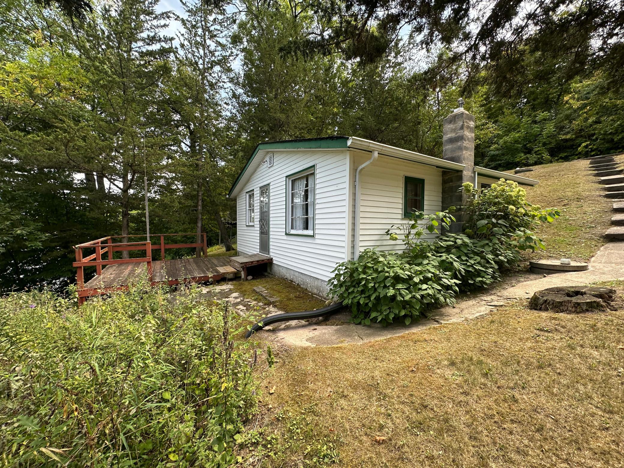 Rare, affordable Lake Koronis opportunity! This 2-bedroom, 1-bath cabin offers a deck overlooking the lake, a storage shed, and a compliant septic. An easement allows connection to the neighboring property's well. An excellent opportunity to renovate and make your own. A great way to get into Lake Koronis ownership. Sells As-Is.