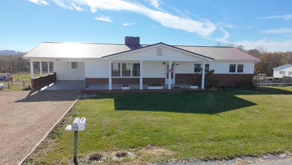 Beautiful 3 BR, 3 BA brick ranch, immaculate & well maintained, & situated in a neighborhood allowing I-81 & US.11 quick access. This home features hardwood, luxury waterproof vinyl & tile floors. Recent updates include thermopane tilt windows, roof, Trane HVAC w/new ductwork for heating/cooling on both levels, crown molding, vinyl siding, guttering & downspouts and new baths on both levels. Spacious living room on the main level has gas logs fireplace and the den in the basement has a brick fireplace set up for electric logs. Kitchen boasts oak cabinetry with pantry space and stainless appliances. Dining room can be used as a sitting area or dining area, actually large enough for both. Unique fixtures include blue tooth bath lighting, music, mirror in owners suite, as well as barn door in dining room and antique door closure in owners suite. Owners bath features a walk-in tile shower also. Full basement has a full new bath, workshop room, cool storage room, family room, 2 other large rooms for expanding into finished living area. Beautiful lot has fencing, backyard above ground pool and beautiful landscaping. Great covered porch and carport/patio at the front. Outbuilding is 2 years old. Pea gravel drive. Take a look today!