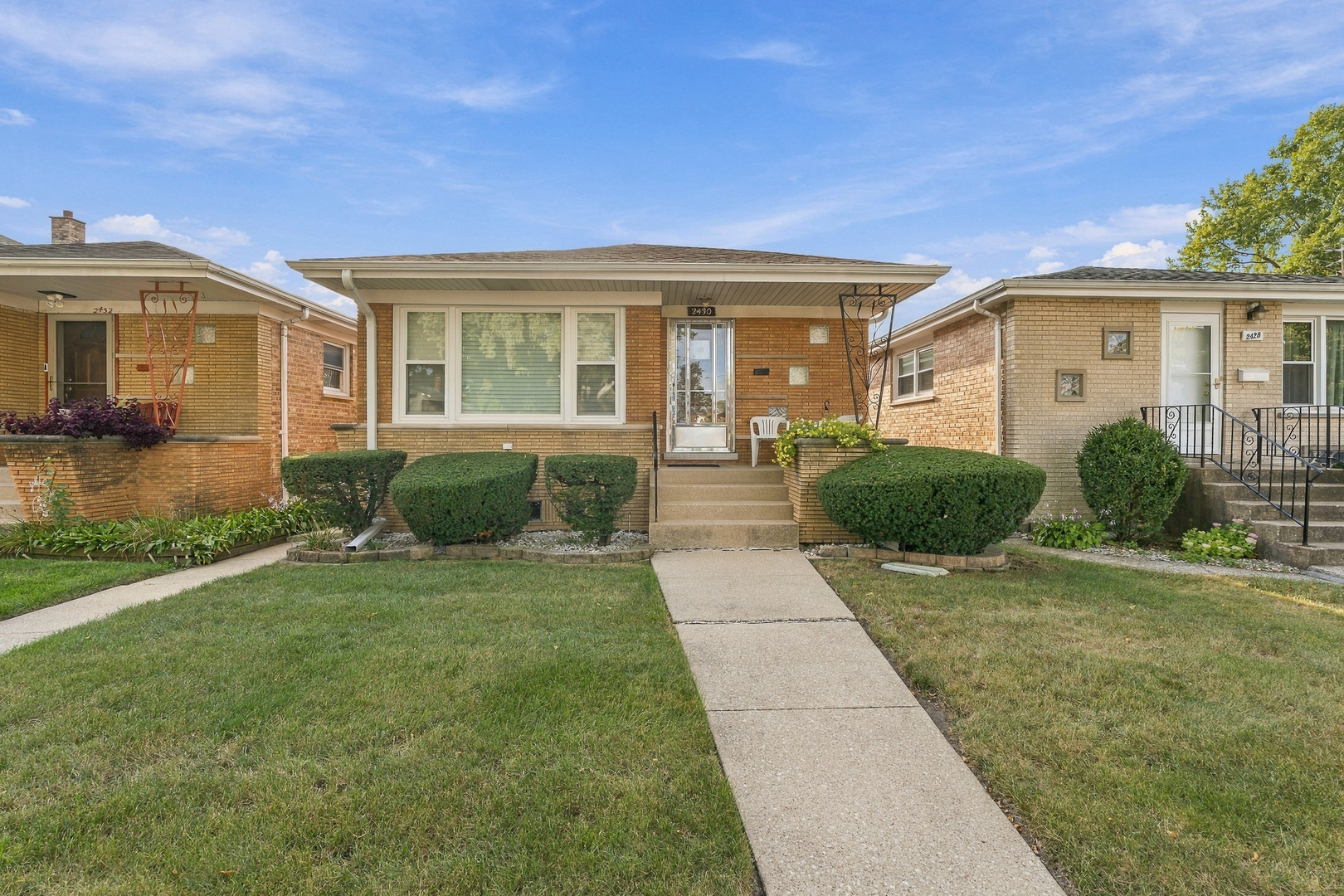 Beautifully maintained and nicely updated brick home nestled on a quiet cul-de-sac street just moments from a scenic park! This inviting residence offers a wonderful blend of comfort, character, and versatility, beginning with a sun-filled living room accented by gleaming hardwood floors. The stunning updated kitchen is sure to impress with rich cherry cabinetry, granite countertops, a coordinating granite backsplash, stainless steel appliances, and a convenient pantry closet. The spacious primary bedroom features hardwood flooring, while two additional bedrooms provide plenty of space for family, guests, or a home office. The updated main-level bathroom boasts a large shower and a convenient laundry chute leading directly to the laundry room. The beautifully finished basement offers an exceptional extension of the living space and is ideal for entertaining or related living, featuring a large family room, decorative fireplace, second kitchen, and second full bathroom. Fenced yard with paver patio, 2.5 car garage with overhead door to yard for ease of mowing and outdoor gatherings. Major improvements include a new furnace and air conditioner in 2019, a new roof and gutters in 2019, and most windows replaced approximately 4-5 years ago. All furniture is negotiable, making this wonderful home an even more attractive opportunity. A fantastic location, versatile floor plan, and thoughtful updates make this one you won't want to miss!