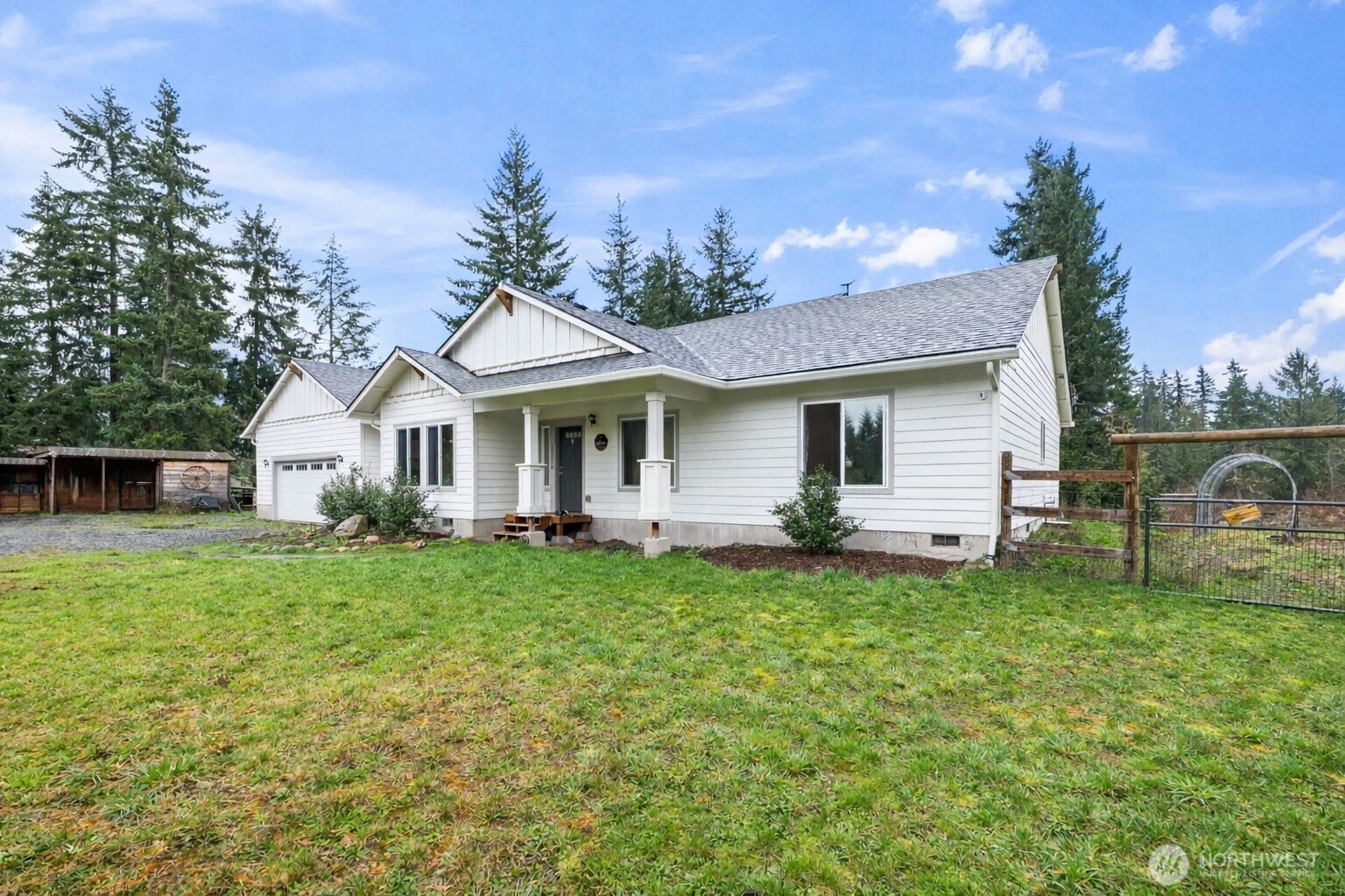 Modern 5-Acre Estate with Mountain Views, Private Pond & Gated Entry in Rainbow Ridge Estates Orting.    Welcome to 23210 188th St E, Orting, WA—a rare opportunity to own a 2021-built rambler rambler on 5 acres overlooking a year-round pond with naturally spawning fish and panoramic Mt. Rainier views. This 4-bedroom + office, 2-bath, 2,676 sq ft home offers spacious single-level living with an open-concept layout, large living area, and a functional kitchen designed for everyday living and entertaining.    The primary suite provides a private retreat with a full bath, while additional bedrooms offer flexibility for guests, or multi-generational living.    • 24x36 three-stall barn with hay storage—ideal for equestrian use or hobby farming.   • Private pond with freshwater trout + scenic mountain views.  • Gated entry for privacy and security.  • RV parking  • Quiet cul-de-sac location.     Built with cement plank siding, forced air heating, and central A/C.    Conveniently located just minutes from downtown Orting, this property offers the perfect balance of rural living with easy access to amenities, schools, and commuter routes.    This is a rare opportunity to own a scenic property at a compelling price. Priced below market to reflect cosmetic updates needed (flooring, trim, paint, landscaping), allowing buyers to build instant equity and personalize finishes.    ***Receive a $10,000 Lender Credit towards the purchase of this home with our preferred lender!**