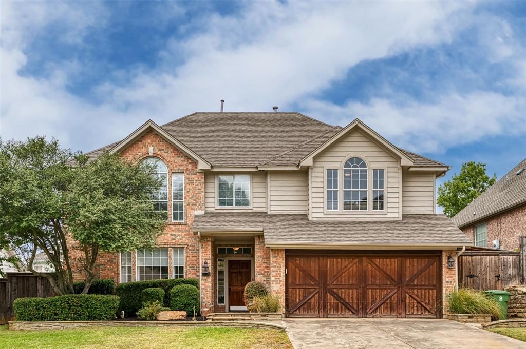HIGHLY SOUGHT-AFTER CARROLL ISD! This stunning Grapevine home offers 4 beds, 3 full baths, dual living spaces, two dining areas, and an extraordinary outdoor oasis. Step inside to soaring ceilings, rich hardwoods, and expansive windows. The main level includes a guest bedroom with full bath, a chef's kitchen with granite counters and stainless appliances, a butler's pantry leading to the formal dining room, and laundry room. Upstairs features a versatile loft living area, a secondary bedroom, and a private primary suite with double vanities, a spa-like bath, walk-in shower, and His and Hers closets - including an adjoining 4th bedroom transformed into an incredible custom closet (easily converted back). Outside, relax by the resort-style pool with grotto waterfall, outdoor kitchen with built-in grill, outdoor bar, covered patio, and custom putting green! Unbeatable location close to Southlake Town Square, Lake Grapevine, major hwys, and DFW Airport.