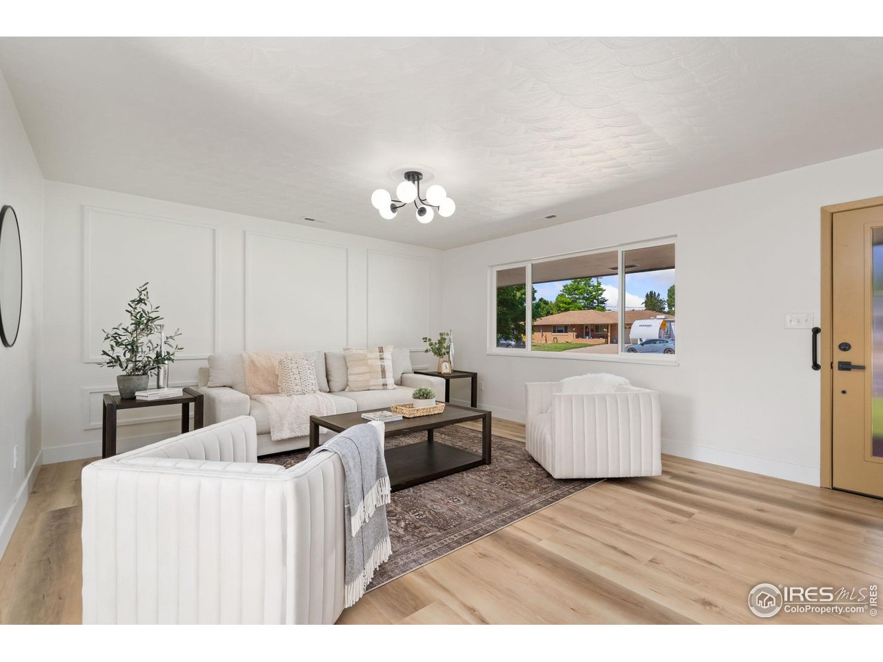 $2,500 Lender Credit if using Justin Crowley with First Western Trust. Completely renovated home feels brand new from top to bottom and is ready for its next owner to move in and enjoy immediately. Nearly every surface and system has been updated, offering the perfect blend of comfort, style, and modern efficiency. Step inside and be welcomed by luxury vinyl plank flooring and soft new carpet throughout. The open, light-filled layout features brand new energy-efficient vinyl windows and modern, stylish lighting that elevates every space. The kitchen has been fully redesigned with brand new stainless steel appliances, updated cabinetry, and sleek finishes that make cooking and entertaining a pleasure. No detail was overlooked in the renovation of the bathrooms, which include custom tile work and thoughtful design elements. The primary suite features a stunning walk-in shower with dual showerheads and modern fluted tile. The fully finished basement provides ample living space with a rec room, 4th bedroom or home office, and dedicated storage room, adding both flexibility and value. Comfort is ensured year-round with a brand new forced air furnace and central air conditioning system. Outside, enjoy fresh landscaping with newly laid sod, a functional sprinkler system, and clean curb appeal. The spacious driveway leads to a large two-car attached garage which can fit a full size pickup, and the home backs to an alley rather than neighbors, offering enhanced privacy and quiet. A newer roof adds peace of mind, and with no HOA or metro district, you'll enjoy the freedom to truly make this home your own. Whether you're looking for a low-maintenance primary residence or a high-quality investment, this home offers unmatched value in a fantastic location near parks such as Benson Sculpture and North Lake train park, Lake Loveland, schools, and everyday conveniences. It's essentially new construction-without the wait or cost. Come see the difference a full renovation makes!