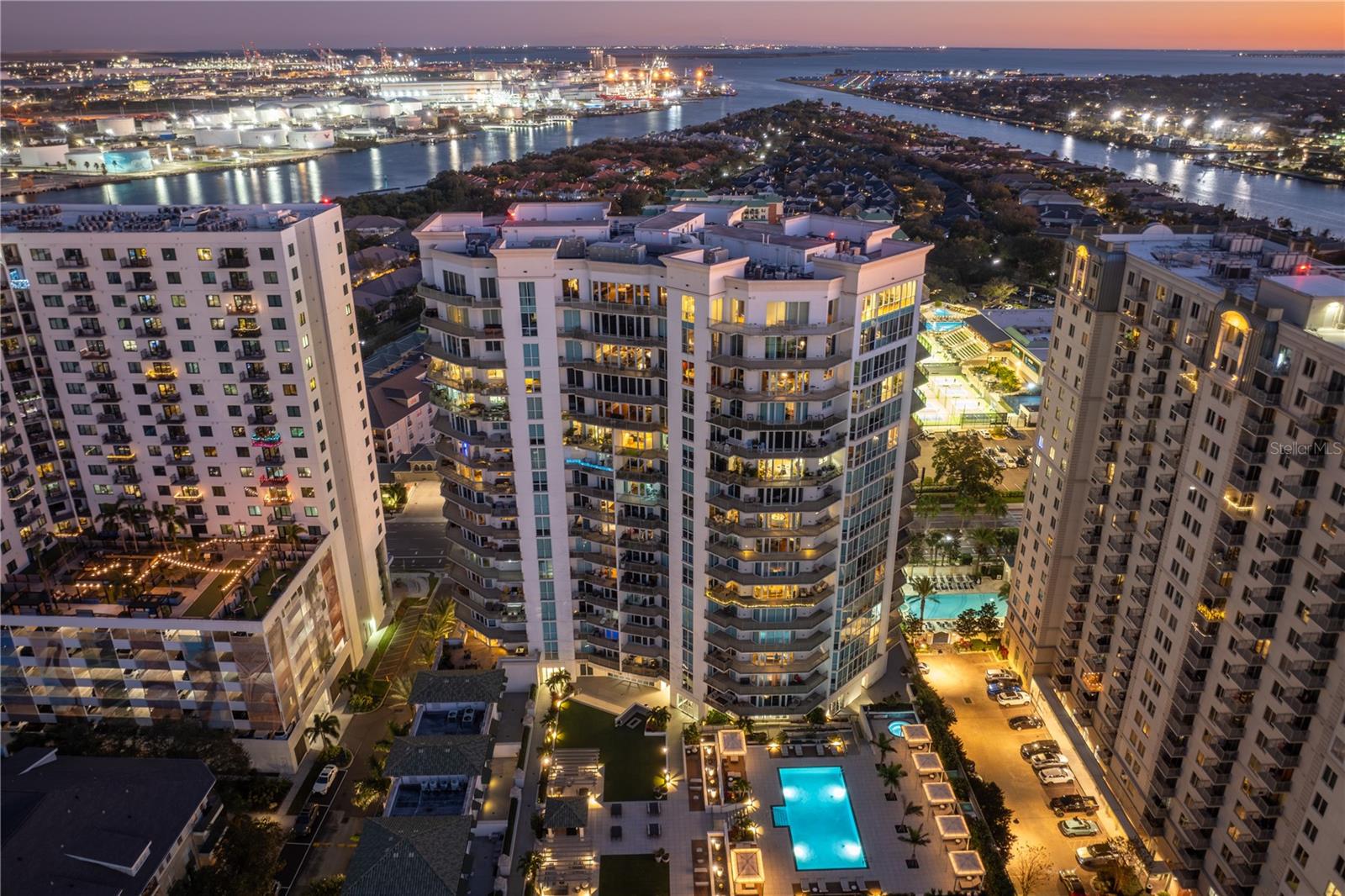 Sky-high refinement defines this one of a kind condo as it hits the open market for the first timeever at The Plaza Harbour Island. This masterfully executed combination of two unitsrepresents the largest residence in the building, boasting a sprawling 4,816-square-footfootprint that commands breathtaking vistas of the Downtown Tampa skyline, the cruise shipsof the channel, and the iconic curves of Bayshore Boulevard. Arrival is a cinematic experiencevia a private elevator lobby that opens into a grand gallery adorned with a biofuel fireplace andan integrated sound system. Every inch of the interior reflects an incredible investment inquality, highlighted by custom designer lighting and meticulous artisanal finishes—allmaintained in pristine condition. The entire environment is an automated masterpiecepowered by a fully integrated Savant smart home system, providing seamless mobile controlover lighting, climate, shades, entertainment, and security cameras from any device.The culinary center is a masterclass in professional-grade utility, featuring two side-by-side Sub-Zero refrigerators, two cooling drawers, and a full suite of Miele appliances including a gascooktop and dual dishwashers. This space flows into a striking, glass-enclosed climate-controlled wine cellar, featuring a brand-new cooling unit and a custom display configuration.High-performance infrastructure underpins the estate, including three 5-ton Trane AC unitswith handlers, a massive 120-gallon industrial-grade water heater, and a brand-new Culliganwater softener. The primary retreat serves as a private wellness sanctuary, featuring a fullprojector system with an auto-stow screen and dual illuminated closets with bespoke luxurystorage solutions. The ensuite is anchored by a Toto 750H bidet and a digitally controlled walk-in shower with optional steamer capabilities.This residence offers the only four-car parking allocation on the first level of the building,complemented by a private storage locker on the third floor. For the ultimate in privacy, astrategically separated guest suite offers its own breakfast area and ensuite bath, while a playerbaby grand piano by RitMuller adds a distinguished touch to the living salon. Residents benefitfrom full valet service—accessible via text—the acclaimed Plant High School district, and adedicated building staff currently overseeing a full exterior refresh. Upon closing, the buyer willreceive a comprehensive instruction manual and a personal tutorial to ensure a seamlesstransition into this unparalleled Harbour Island legacy. Schedule your private sanctuary tourtoday!