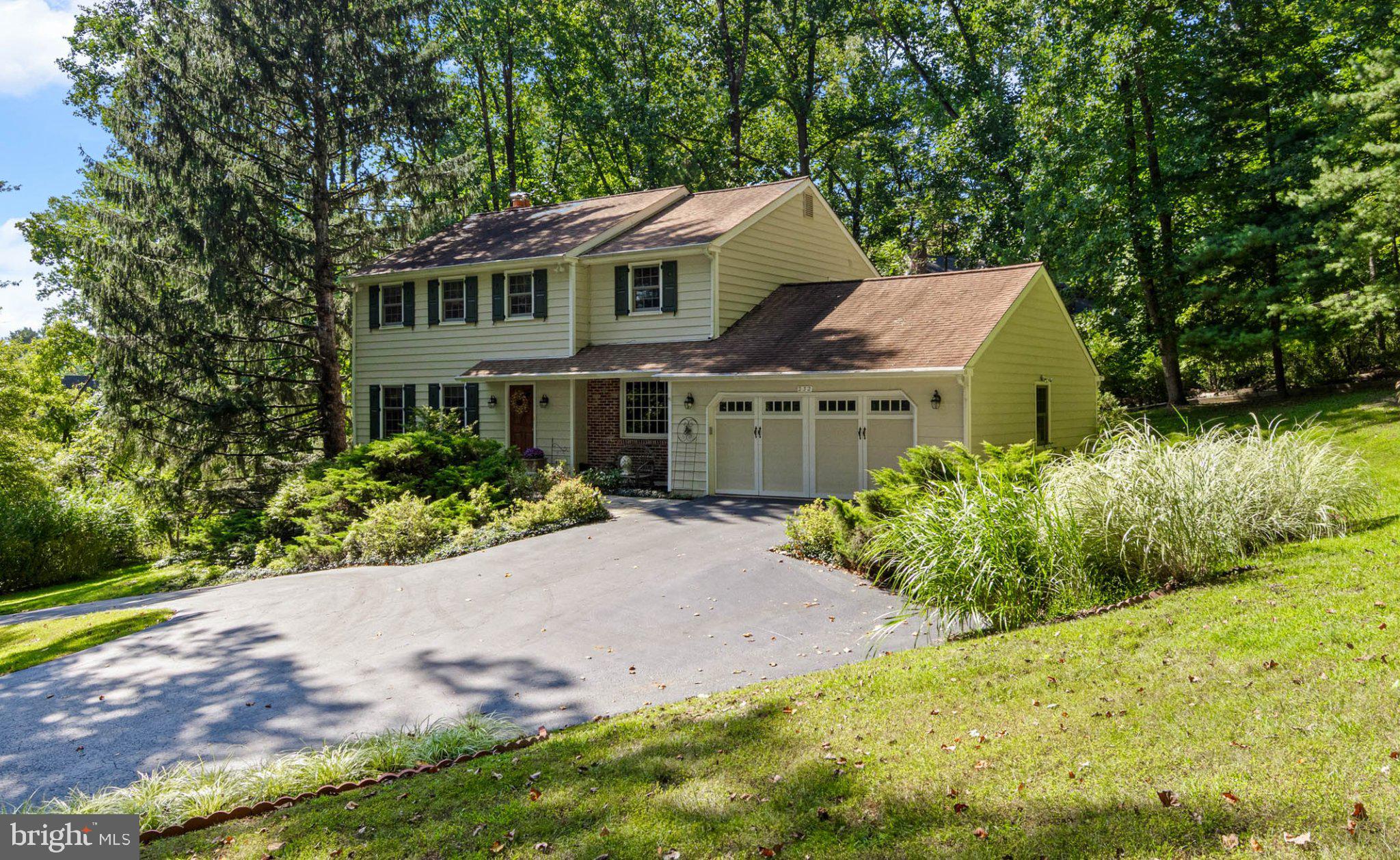 Welcome to Greene Countrie. Tucked away on a beautiful, secluded lot in one of Newtown Square’s most sought after neighborhoods. This classic Center Hall Colonial offers the perfect blend of timeless elegance, comfortable living, and thoughtful updates, with four bedrooms, two and a half baths, an oversized two-car attached garage, and exceptional privacy, this is a home you will be proud to call your own. From the moment you enter, the traditional center hall welcomes you into gracious formal Living and Dining Rooms, featuring beautiful hardwood floors and crown molding. The spacious Family Room offers a wonderful open feel with a gas fireplace, custom built-ins, and recessed lighting, an inviting gathering place for family and friends. At the heart of the home is the beautifully updated Kitchen, designed for both everyday living and entertaining. Custom cabinetry, granite countertops, a large granite center island, tile backsplash, stainless-steel appliances, and a generous breakfast area create a warm and functional space. Just steps away, the enclosed three-season porch provides a peaceful retreat with wonderful views of the private backyard and surrounding greenery. A convenient first floor powder room and an updated laundry room with access to the rear yard adds to the home's functionality. The second floor features a spacious Primary Bedroom with an updated private bath, three additional bedrooms, all with hardwood floors and an updated hall bath. The finished daylight lower level offers valuable additional living space and can easily serve as a home office, den, exercise room, or recreation area. Outside, the deck and enclosed three season porch creates the perfect setting for relaxing, entertaining, or simply enjoying the tranquility of this special property. Numerous improvements provide peace of mind, including a new heating and cooling system (2025), whole-house generator (2019), hot water heater (2019), Weather Shield tilt-in replacement windows, updated primary and hall baths, and paver front walkway and rear patio. The three-season porch has been enhanced with new screen doors, and a Casablanca ceiling fan. Ideally located in the heart of Newtown Square with convenient access to shopping, dining, major roadways, and everything the surrounding Main Line has to offer. A beautiful home, a private setting, and a location that is hard to beat, this is the Greene Countrie Colonial you've been waiting for.