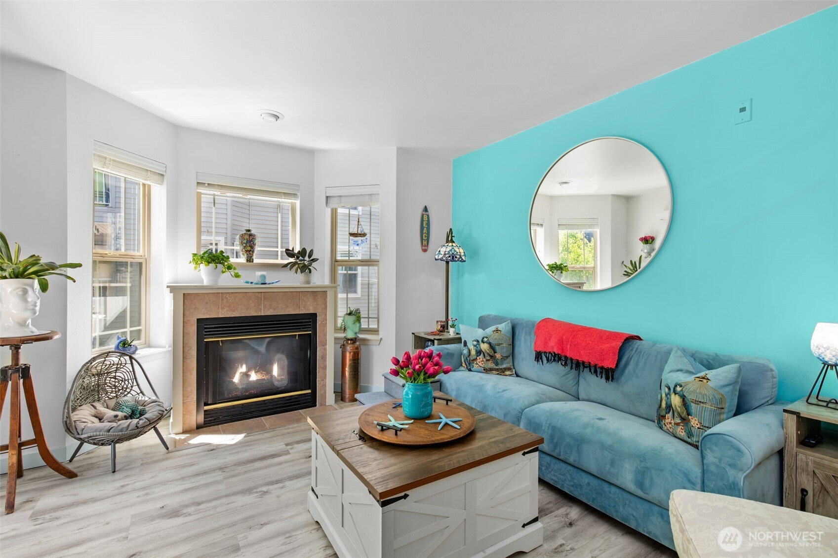 Located minutes from downtown Edmonds, the light rail, and Edmonds amenities, this corner unit at Turnberry Lane is ready for its next chapter! The luminous, single-level layout boasts south-facing windows that fill the open living spaces with natural light, a cozy gas fireplace, in-unit laundry, and two generous bedrooms, including a primary suite with a walk-in closet and an ensuite bath. A private balcony, rental-free community, friendly neighbors, elevator access, and secure garage parking complete the package. With trails, a golf course, shopping, dining, and parks nearby, enjoy the best of the coveted Edmonds lifestyle!
