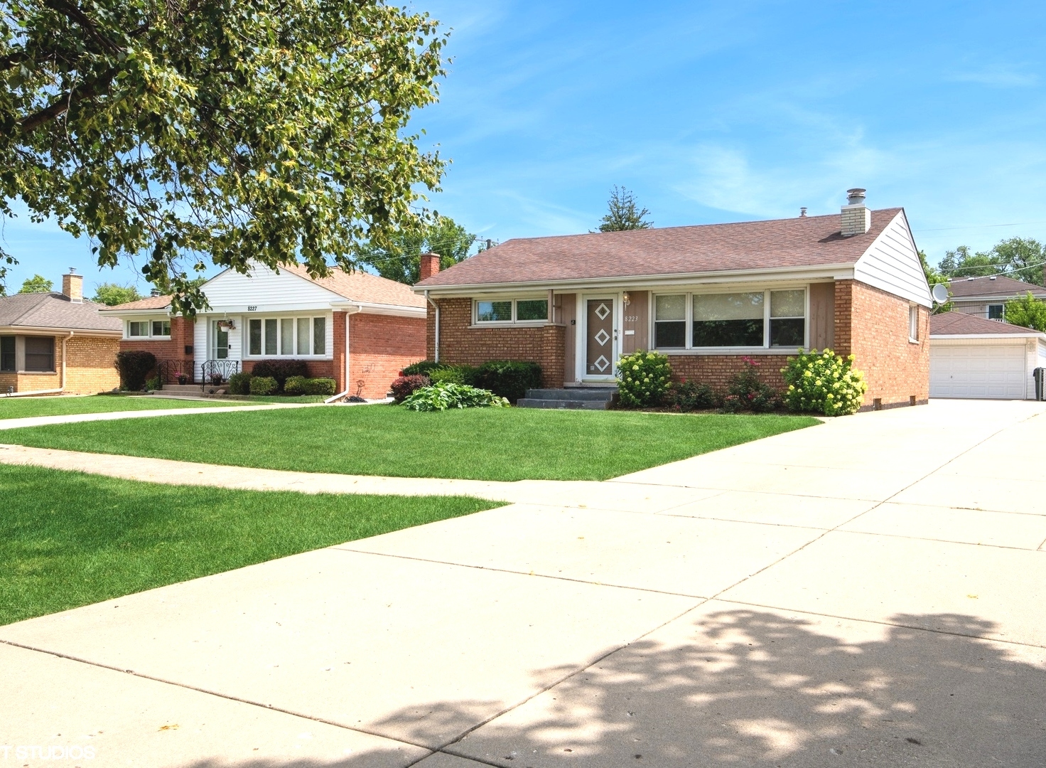 Discover the perfect blend of comfort, character, and convenience in this charming brick step-up ranch, nestled in a prime Niles location! Step inside this well-maintained home to find an open floor concept, a bright and spacious L-shaped living/dining room highlighted by a classic brick fireplace, two generously sized bedrooms and a recently updated full bathroom (2020). Plus, a versatile family room offers additional space for relaxing or entertaining and opens directly to the inviting backyard complete with a patio ready for your summer BBQs and outdoor fun. The full basement offers incredible potential and is ready for you to bring your vision to life. Will you refinish the rec room for additional living space and enjoy the benefit of extra storage in the unfinished area, or will you create your dream workshop or home gym? The possibilities are endless! Flood control system (2013) provides peace of mind and has been maintained annually. Outside, the long driveway leads to a detached 2-car garage, offering ample parking and storage. Enjoy the benefits of low Niles taxes, free local bus service, and unbeatable proximity to grocery stores, shopping, dining, entertainment, and top commuter options - including major highways, Metra, O'Hare Airport, and public transit. Sold AS-IS. Don't miss the opportunity to make this home your own!