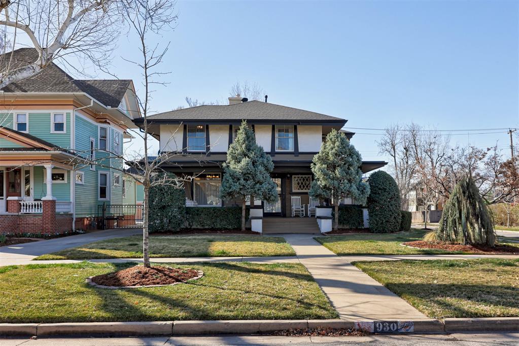 Exquisite historic residence on a corner lot in the coveted Mesta Park Historic District, offering a rare blend of timeless architecture, refined updates, and a true resort style outdoor oasis. This 4 beds, 2.1 bath home is  2,525 sq ft  and delivers luxury and lasting value.  A grand wrap around porch creates a striking first impression and is the perfect place to relax and enjoy the charm of this historic setting. Inside, original hardwood floors, abundant natural light, and elegant spaces define the home’s character. The formal living room features a charming fireplace and flows seamlessly into a bright and inviting formal dining room framed by expansive windows. The fully remodeled kitchen blends modern convenience with timeless style, ideal for both everyday living and entertaining. An informal living room or bonus room at the back of the home overlooks the pool  with beautiful backyard views. Upstairs, the spacious primary suite offers an attached bonus room with a closet, ideal for a sitting room, office, dressing room, or nursery. Three additional bedrooms provide flexibility for family and guests. Designed for elevated outdoor living, the backyard is a true oasis. The heated gunite pool and spa with wireless controls are complemented by a dedicated pool house, pergola, and beautifully designed landscaping with turf and irrigation for easy maintenance. Whether hosting gatherings or enjoying quiet evenings at home, this outdoor space offers a resort like experience year round.The finished, temperature controlled garage overlooks the pool and offers incredible flexibility as a pool house, man cave, workout space, or private entertaining area. Whether hosting gatherings or enjoying quiet evenings  at home, this outdoor space offers a resort like experience year round. Extensive improvements include a newer roof, updated HVAC, plumbing upgrades, new sewer line, storm windows, security and camera system, and a finished temperature controlled garage.