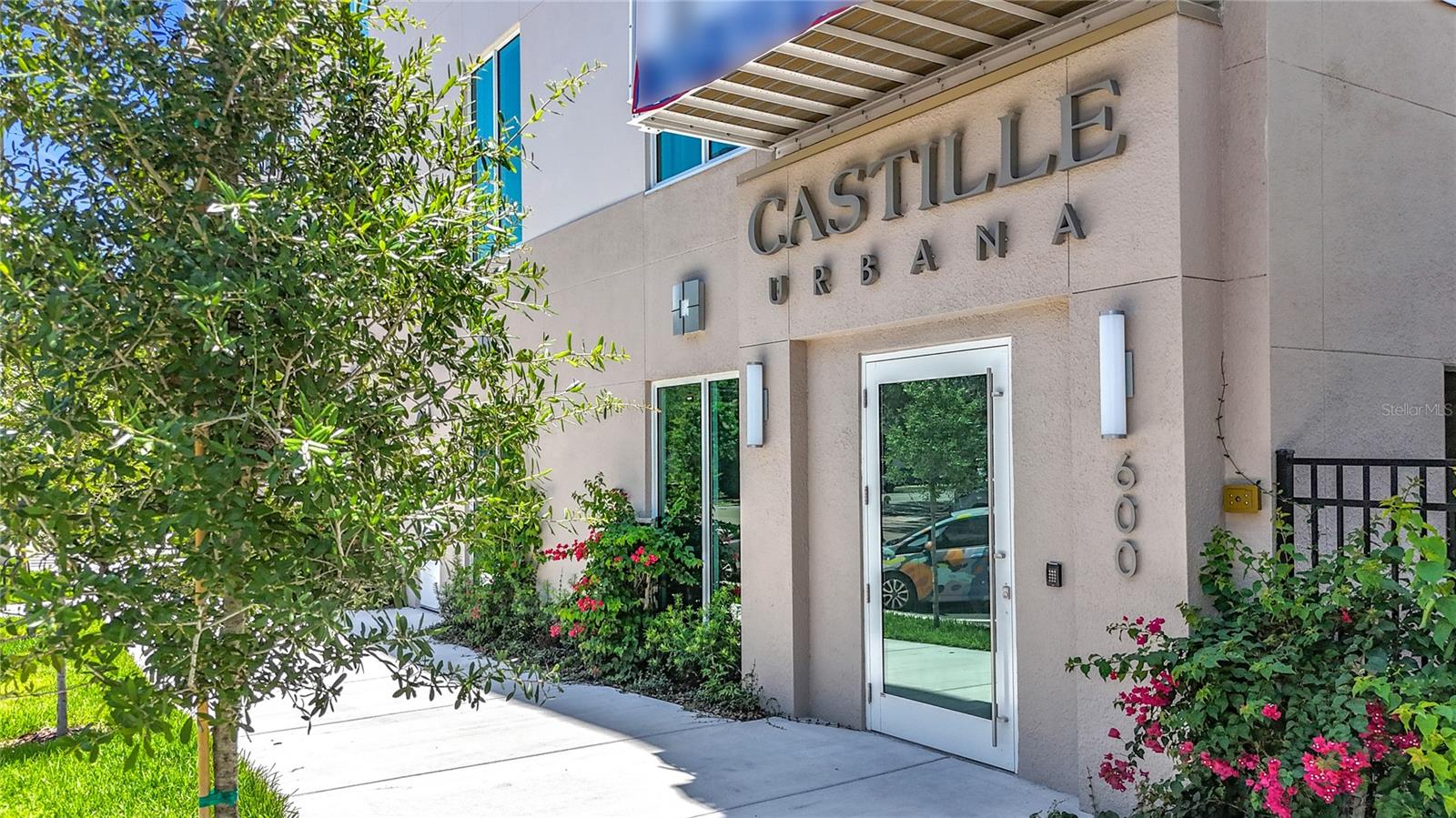 Wow! Unreal - What a Beautiful, BRAND NEW WATER VIEW CONDO - MOVE-IN Ready and Offered fully furnished with stylish West Elm furnishings for your comfort and convenience. A true turn-key GEM - Super competitively Priced! Discover pure LUXURY and Comfort in this exquisite, Light-filled 5rd floor condo, located in downtown St. Pete's new Castille Urbana building. Live within WALKING distance of urban and vibrant attractions, while savoring the tranquility of a peaceful neighborhood, with ample on-street parking for your guests with not only museums, theaters, art galleries, JOHN HOPKINS hospital, USF, Tropicana field, Publix, over 50+ award-winning restaurants, you'll also have easy access to scenic cycling and pedestrian trails, nature preserves, St. Pete Pier and Award Winning Beaches. Imagine everything you could want, all within walking distance! And now: Step into your brand new penthouse condo - 5th floor (no above neighbors), where a feeling of openness and grandeur envelops you with soaring 10' ceilings and an abundance of NATURAL LIGHT. Meticulously maintained, this home caters to your every desire. You can entertain effortlessly in this open living room. BRIGHT kitchen, and spacious dining area, all providing ample space for making cherished memories while hosting with ease. The kitchen is a chef's DREAM, equipped with top-of-the-line stainless steel BOSCH appliances, including a convection oven. GORGEOUS pendant lighting hangs above the LARGE kitchen island, with space for in-kitchen dining. Elegant shaker cabinets provide ample storage, and QUARTZ countertops with well-placed task lighting provide ample prep space. For a quiet night in, you can sip a glass of wine on the BALCONY while taking in a mesmerizing SUNSET and enjoying gorgeous Water Views of our Bay. This home has two generously sized bedrooms, ensuring you have plenty of space for a good night's sleep. Spacious WALK-IN closet, linen closet, and en-suite bathroom provide both luxury and functionality. Additional storage closet can serve as the gym or plethora of extra space. You can indulge in the spa-like en-suite, featuring an oversized shower adorned with Carraca MARBLE tiles, a spacious DOUBLE vanity with brushed-nickel features, exquisite quartz countertops, & double fogless touch-light mirrors. The guest bedroom, located on the opposite side of the home for maximum PRIVACY, also boasts a sizable walk-in closet. Laundry room with ample storage space and conveying washer and dryer, strategically tucked away near the front door plus another Extra storage space/closet. Beautiful wide-plank engineered hardwood flow throughout the home. This smoke-free condo boasts hurricane-rated, UVA-filtering windows and doors, along with fob-entry doors and gated parking to ensure you feel secure at home. Your furry friends are not forgotten! A dedicated DOG-RUN located conveniently in the garage allows your PET to play freely, & a dog-washing station helps keep them clean and pampered. Gym/Community room + Modern elevators allow you to effortlessly take groceries and packages to the 5th floor. An EV charging station can be available for your vehicle via Duke Energy. I-75 is just around the corner, giving you easy access to the entire Tampa-Bay area. Brand New Castille Urbana building is not just a place to live, but a lifestyle you'll LOVE! Experience the epitome of modern, convenient, and luxurious living in this elegant St. Pete condo!