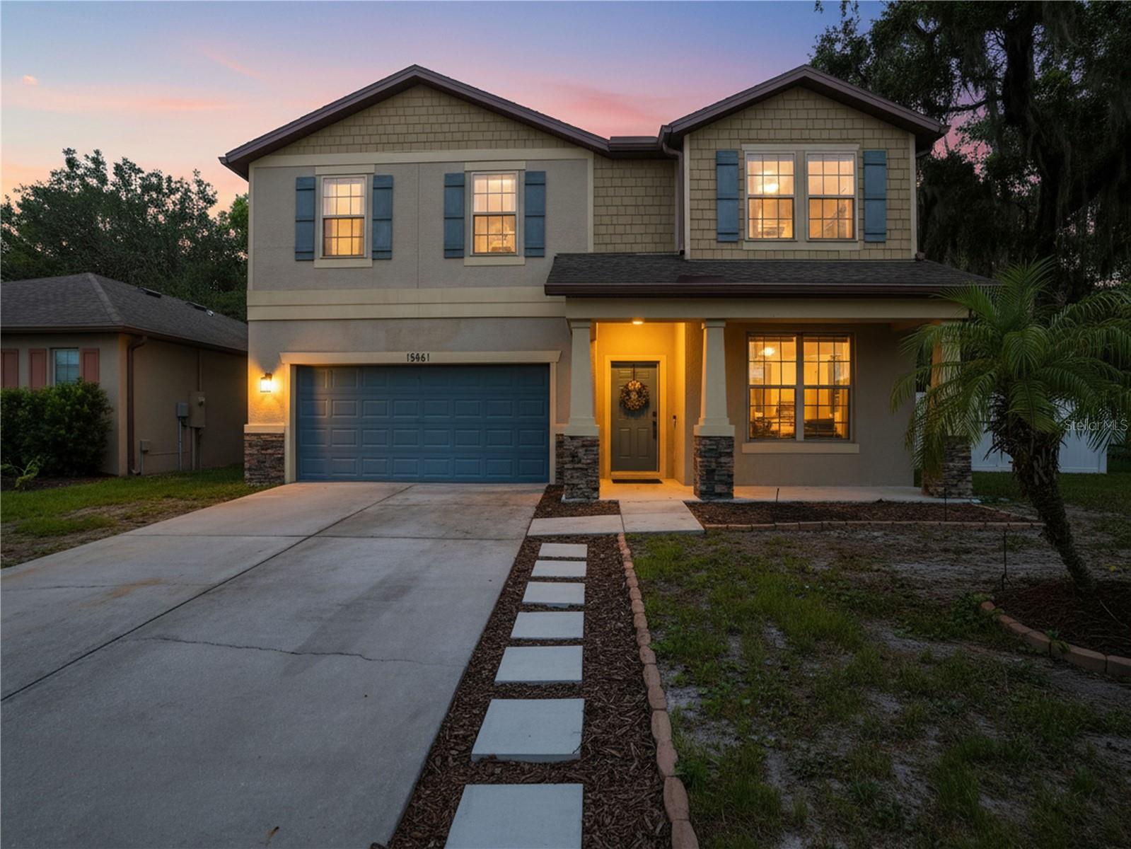 Welcome to this beautifully maintained two-story Pulte home in the desirable Trillium community. Offering 2,661 square feet of living space, this spacious residence features four bedrooms, two-and-a-half bathrooms, a private office, formal dining area and an upstairs bonus room. The open-concept kitchen showcases an oversized center island, abundant cabinetry and a seamless connection to the main living area—perfect for entertaining. Laminate flooring, ceramic tile and carpet provide comfort and style throughout. All four bedrooms and the conveniently located laundry room are upstairs. The primary suite includes a tray ceiling, walk-in closet and private bathroom with dual sinks and a walk-in shower. Outside, enjoy a covered patio and oversized privacy-fenced backyard with a peaceful wooded backdrop. Built in 2017 with the original roof and HVAC, the home also offers an attached two-car garage, public water and sewer, and Flood Zone X designation. Trillium residents enjoy a community pool, playground, sidewalks and recreation areas, with a low monthly HOA and no CDD fees. Conveniently located near U.S. 41 and the Suncoast Parkway.